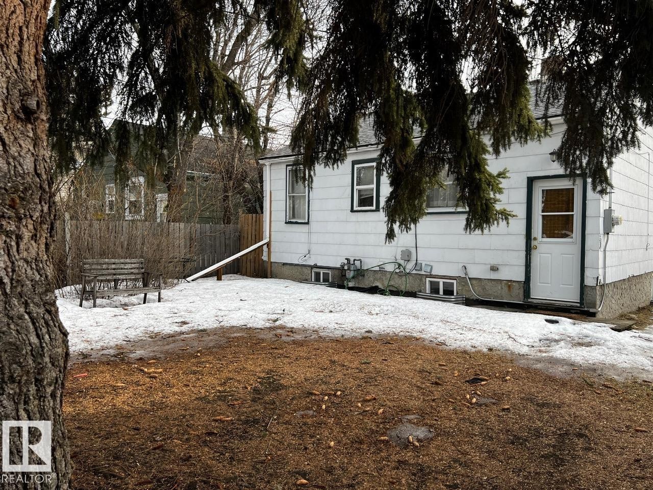 View of snow covered back of property - 10830 68 Avenue, Edmonton, AB - Outdoor