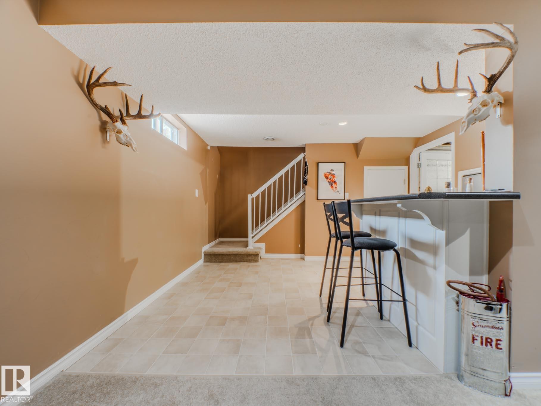 Interior space with stairs and a textured ceiling - 3204 113B Street, Edmonton, AB - Indoor Photo Showing Other Room