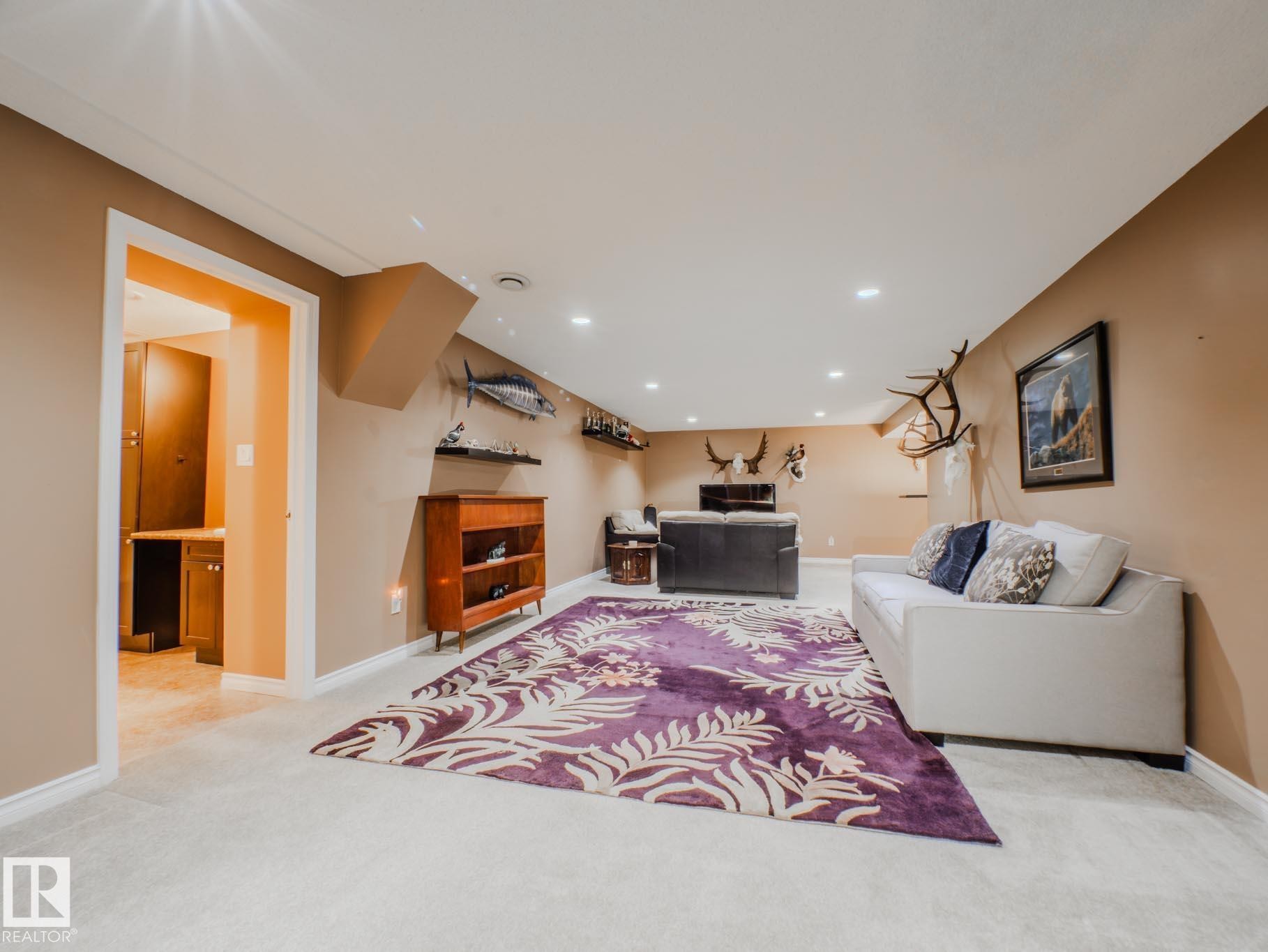 Living room featuring recessed lighting and light carpet - 3204 113B Street, Edmonton, AB - Indoor