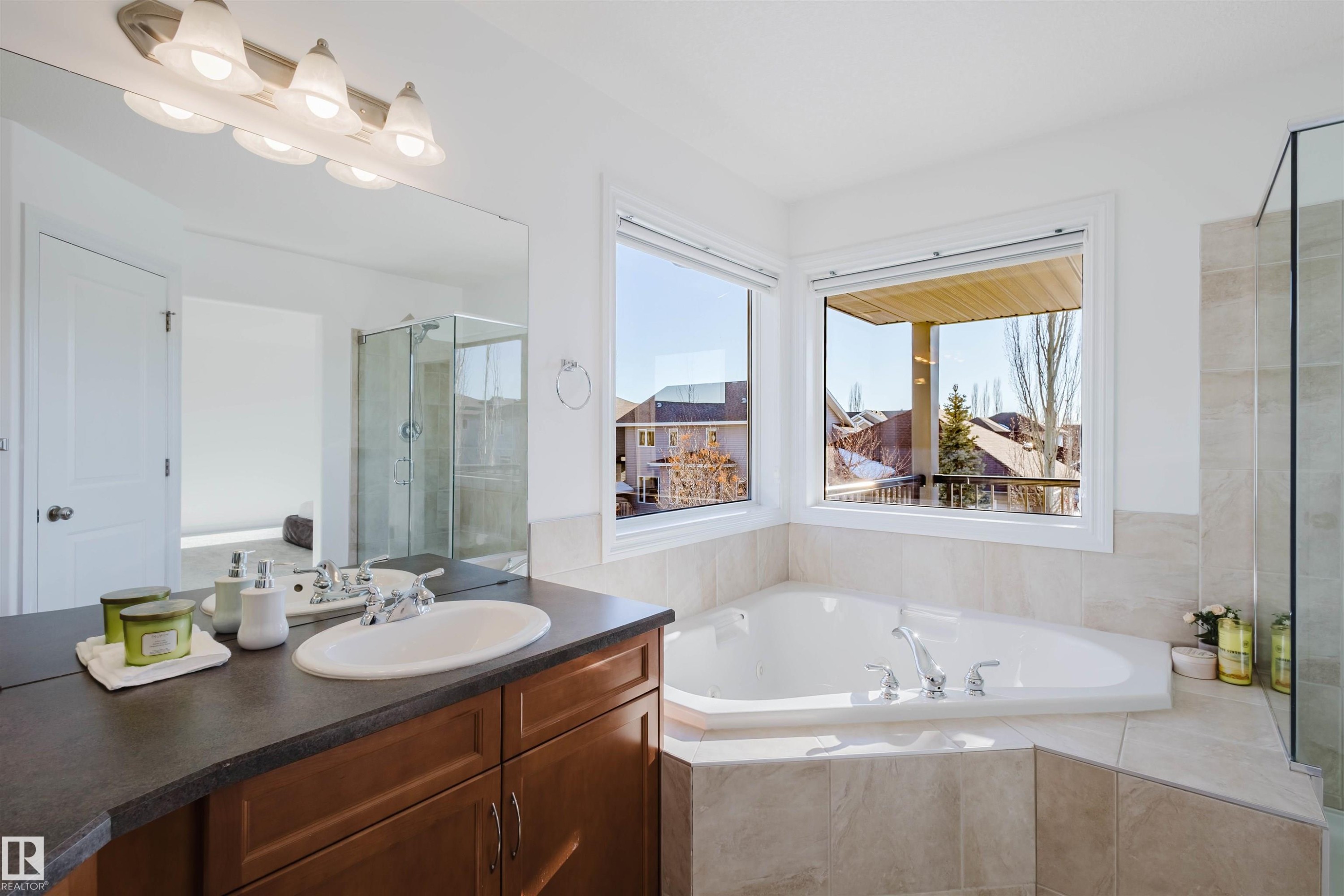 Full bathroom with a garden tub, a stall shower, and vanity - 3547 Mclay Crescent, Edmonton, AB - Indoor Photo Showing Bathroom