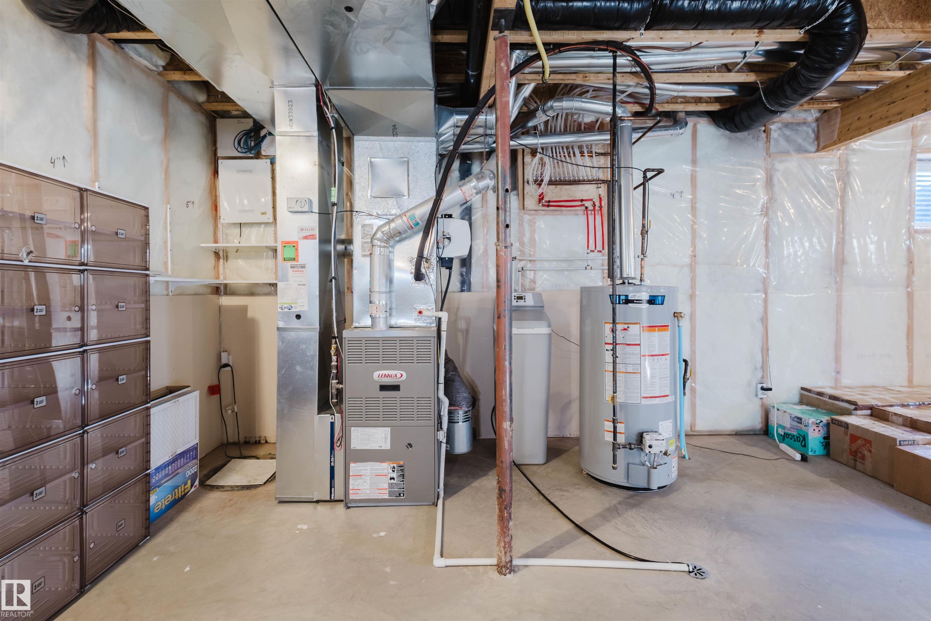 Utilities featuring gas water heater and heating unit - 3547 Mclay Crescent, Edmonton, AB - Indoor Photo Showing Basement