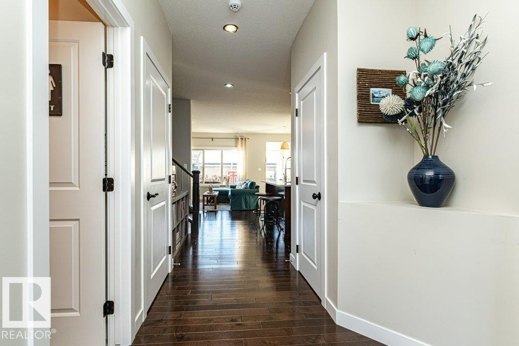 Corridor featuring dark wood-type flooring and recessed lighting - 10535 67 Avenue, Edmonton, AB - Indoor Photo Showing Other Room