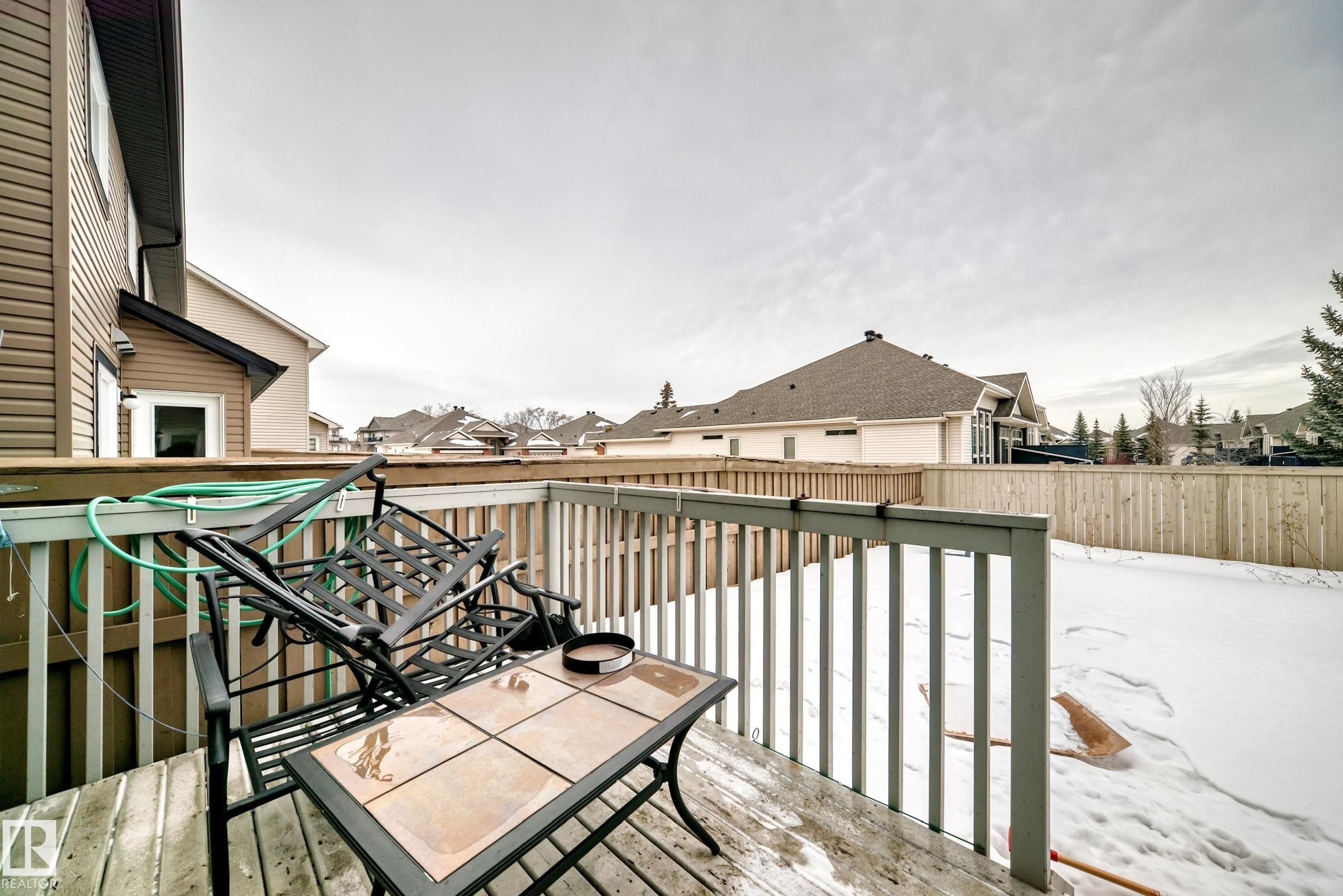 Wooden deck featuring a residential view - 9645 Simpson Place, Edmonton, AB
