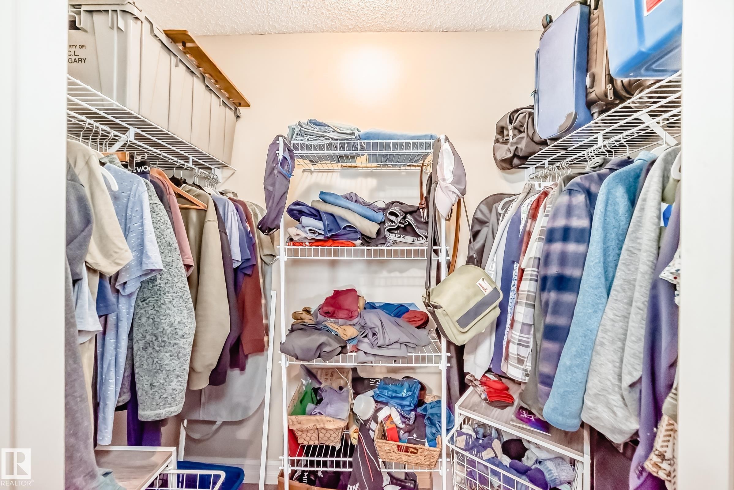 View of walk in closet - 9645 Simpson Place, Edmonton, AB