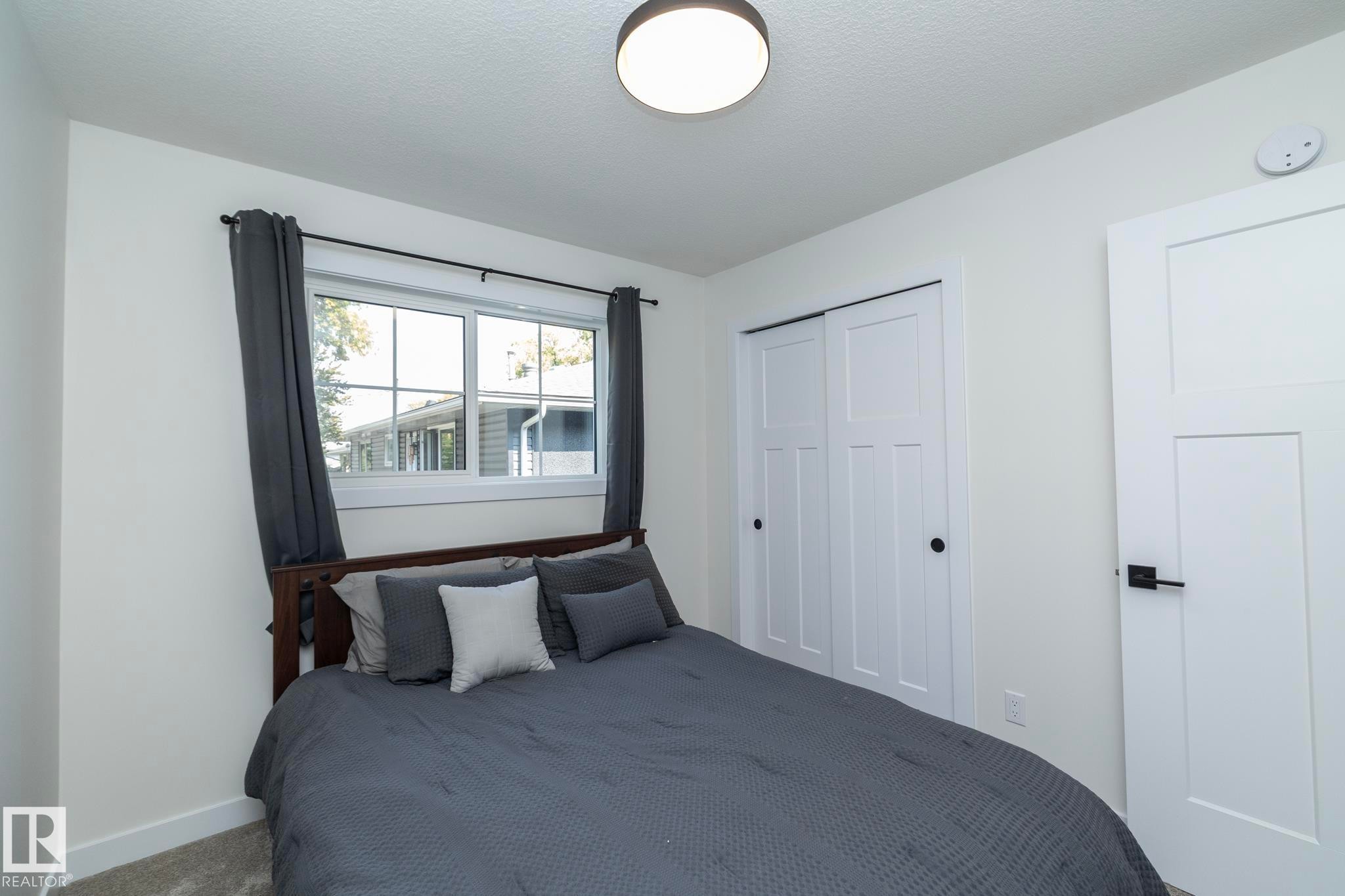 56 Brazeau Drive, Devon, AB - Indoor Photo Showing Bedroom