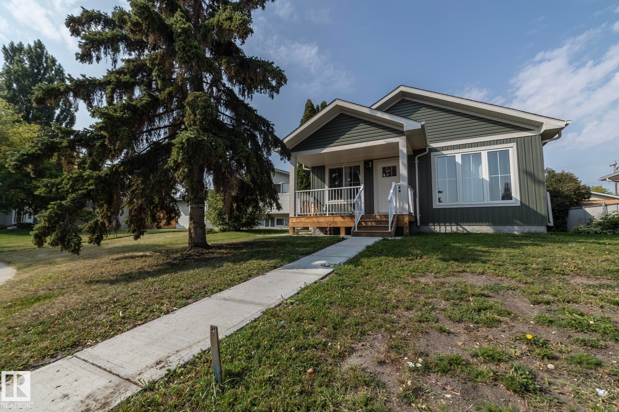 56 Brazeau Drive, Devon, AB - Outdoor With Deck Patio Veranda With Facade