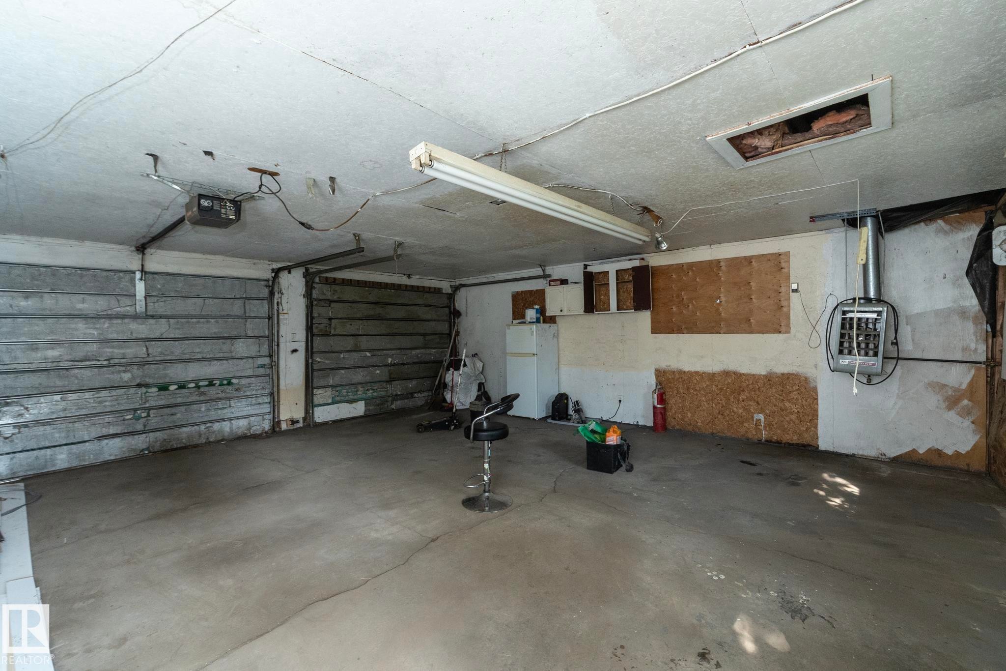 56 Brazeau Drive, Devon, AB - Indoor Photo Showing Garage