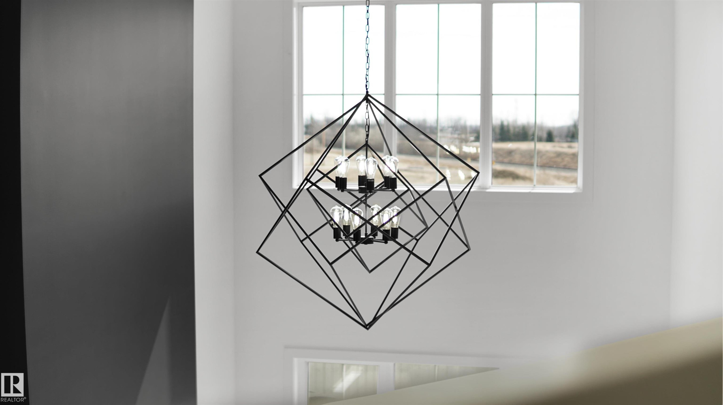 Detailed view of a chandelier - 807 30 Avenue, Edmonton, AB - Indoor Photo Showing Other Room