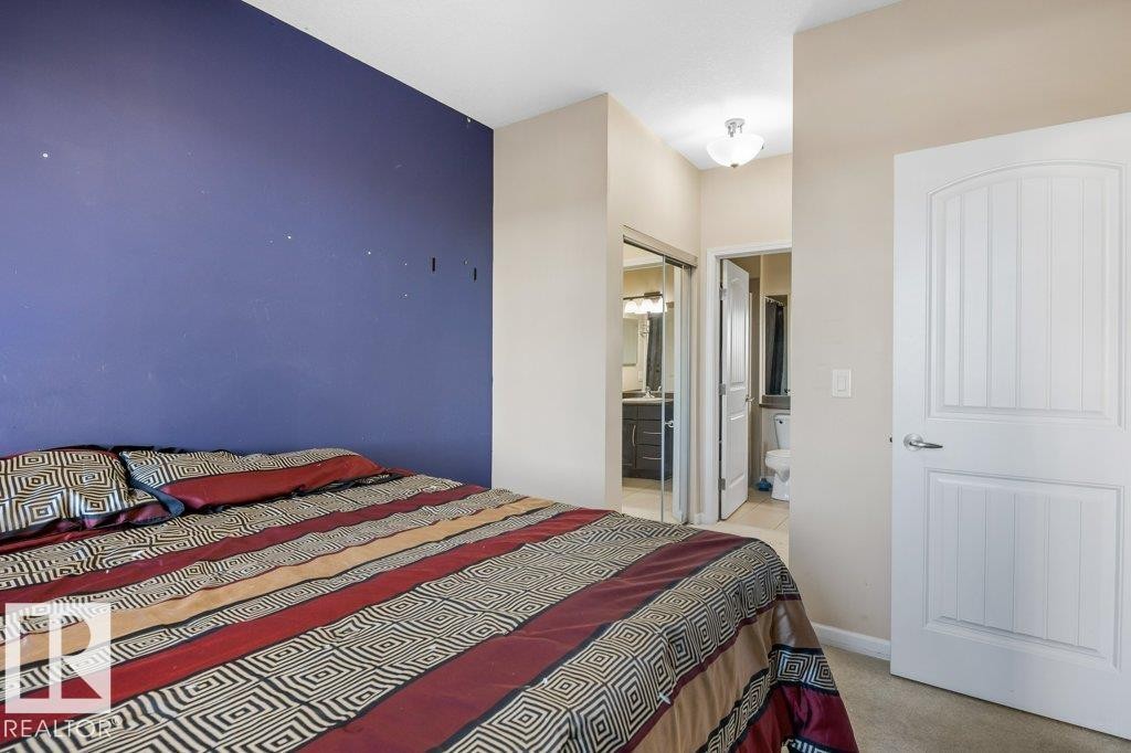 217 6083 Maynard Way, Edmonton, AB - Indoor Photo Showing Bedroom