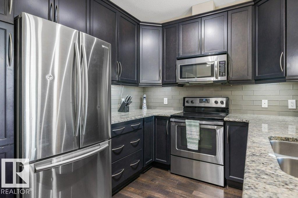 217 6083 Maynard Way, Edmonton, AB - Indoor Photo Showing Kitchen With Stainless Steel Kitchen With Upgraded Kitchen