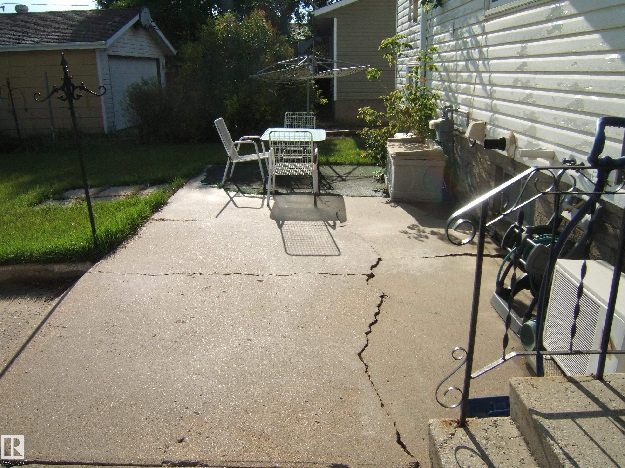 View of patio / terrace with outdoor dining space - 4807 54 Avenue, Two Hills, AB - Outdoor