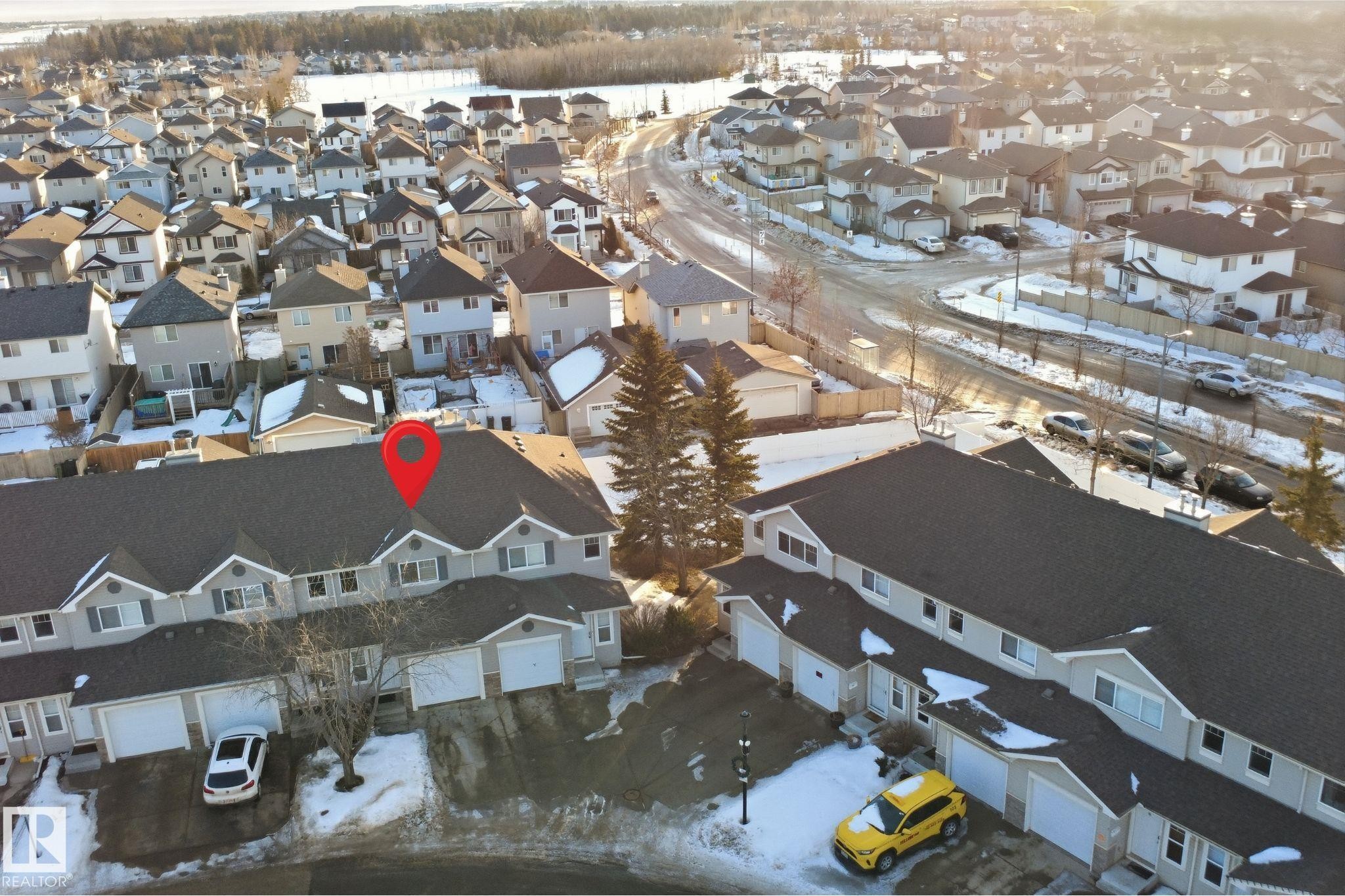 Snowy aerial view with a residential view - 8 230 Edwards Drive, Edmonton, AB - Outdoor