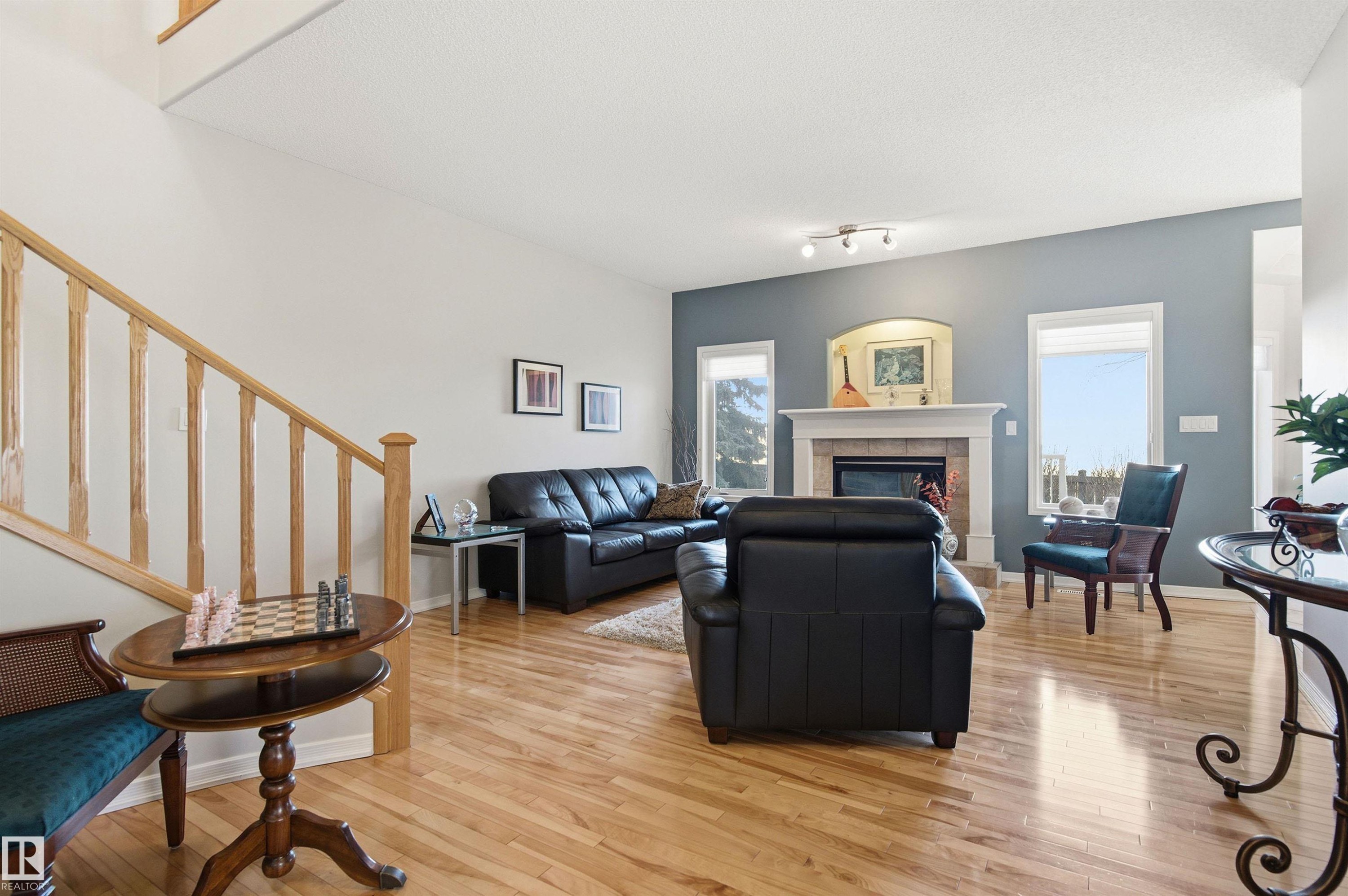 12 577 Butterworth Way, Edmonton, AB - Indoor Photo Showing Living Room With Fireplace