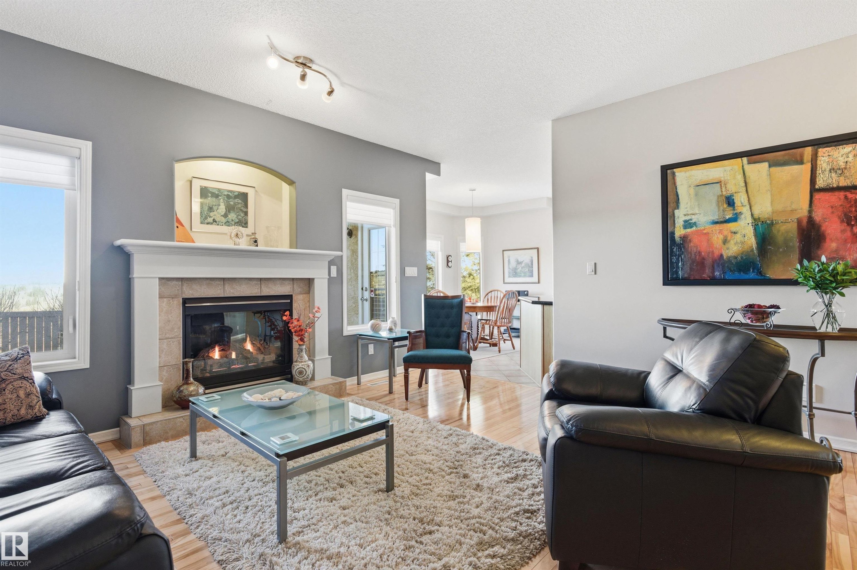 12 577 Butterworth Way, Edmonton, AB - Indoor Photo Showing Living Room With Fireplace