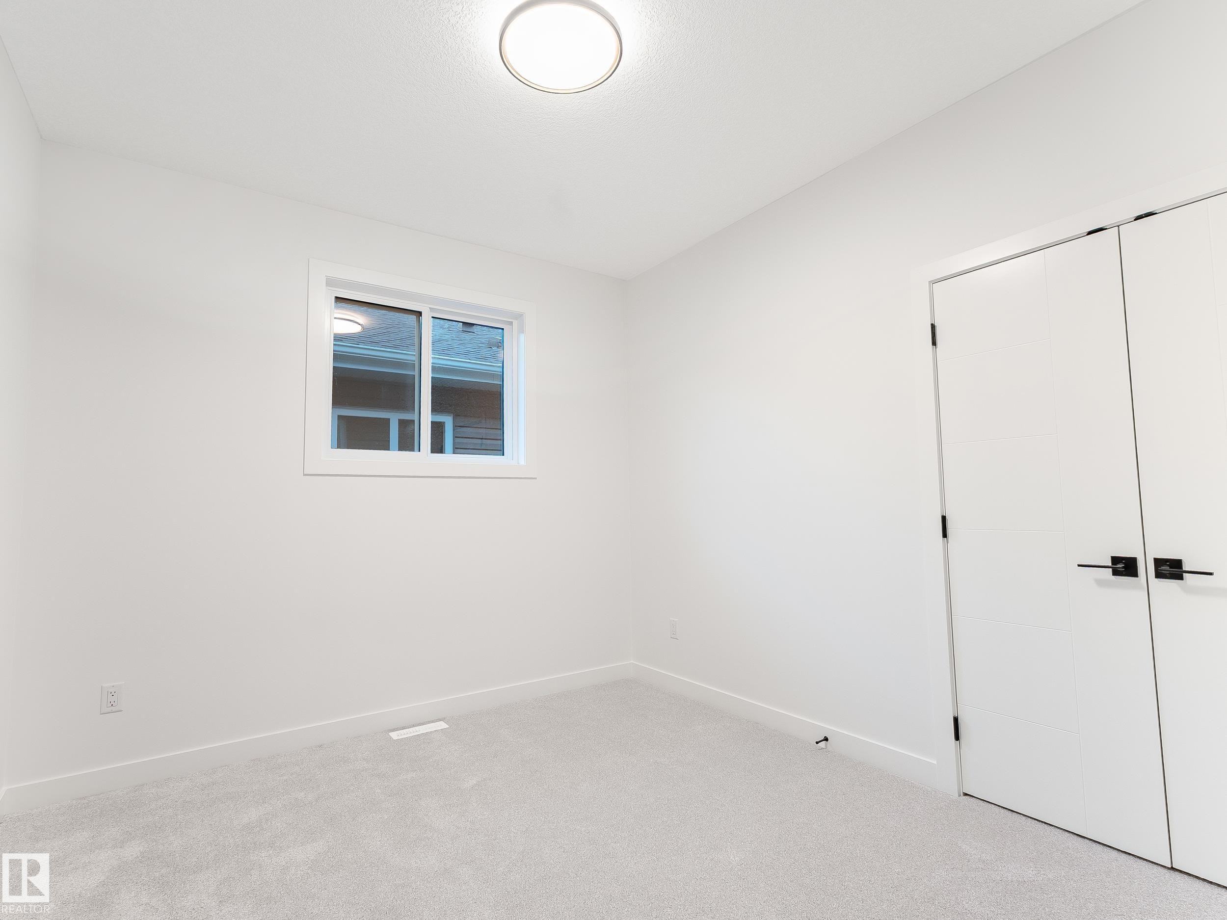 125 Lilac Close, Leduc, AB - Indoor Photo Showing Other Room