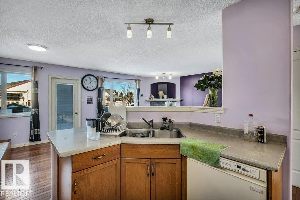 2144 37B Avenue, Edmonton, AB - Indoor Photo Showing Kitchen With Double Sink