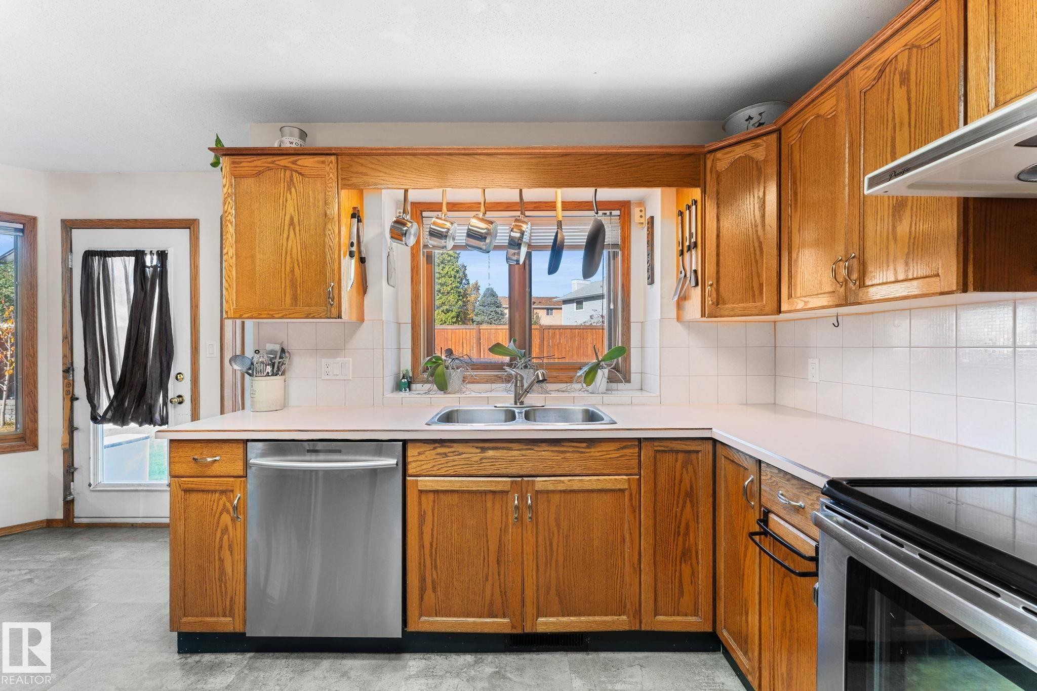 6018 156 Avenue, Edmonton, AB - Indoor Photo Showing Kitchen With Double Sink