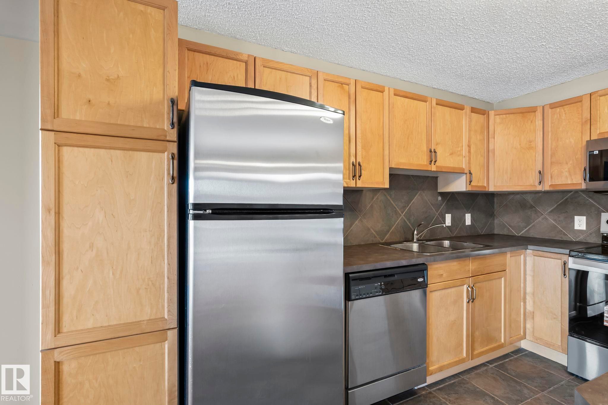 408 2098 Blackmud Creek Drive, Edmonton, AB - Indoor Photo Showing Kitchen With Double Sink