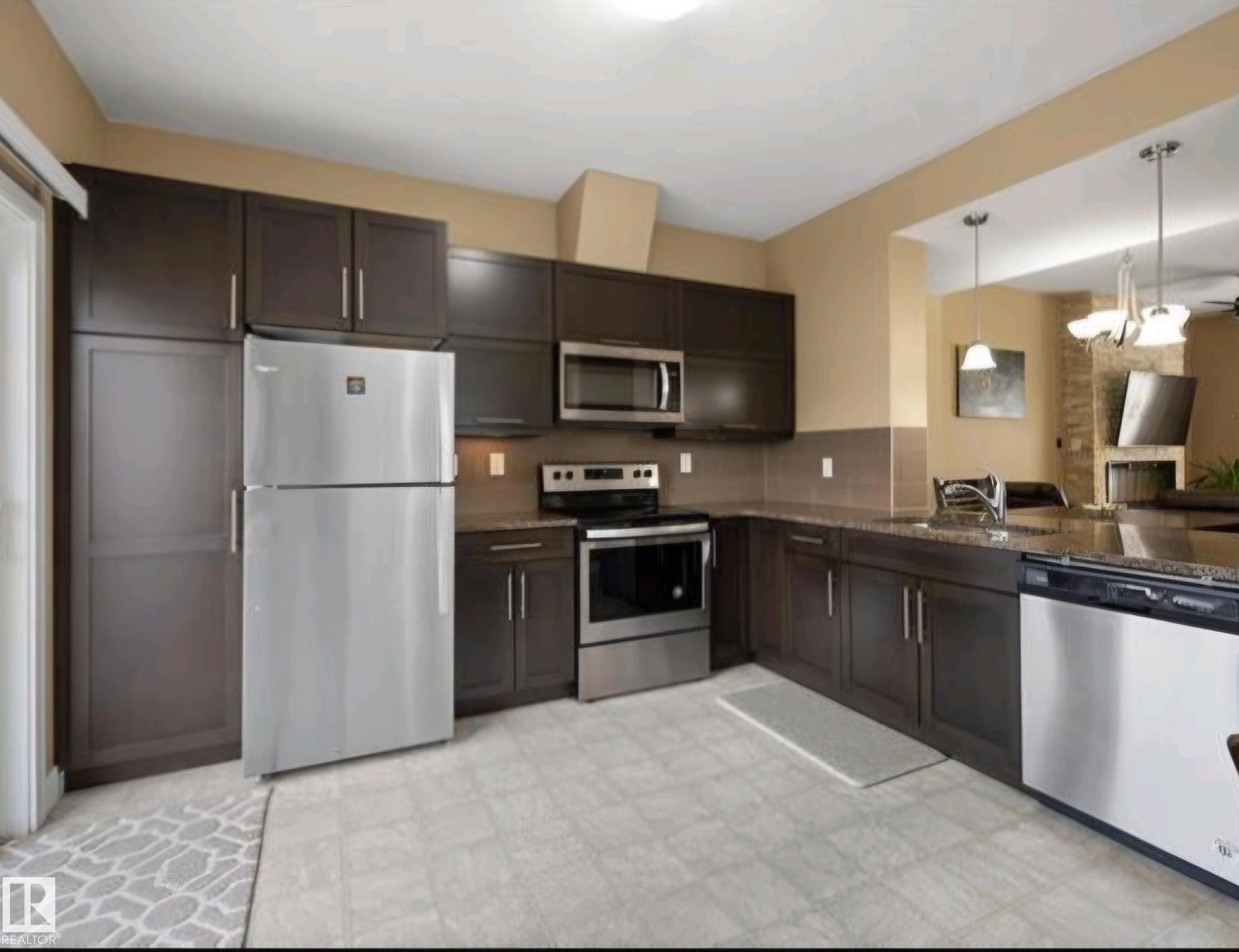 40 13003 132 Avenue, Edmonton, AB - Indoor Photo Showing Kitchen With Stainless Steel Kitchen