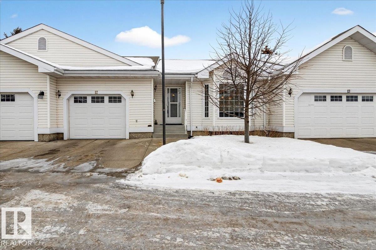 Single story home with an attached garage and driveway - 13217 155 Avenue Nw, Edmonton, AB - Outdoor With Facade