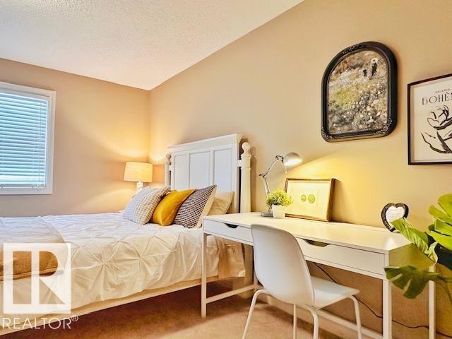 Bedroom with a textured ceiling - 12219 167A Avenue, Edmonton, AB - Indoor Photo Showing Bedroom