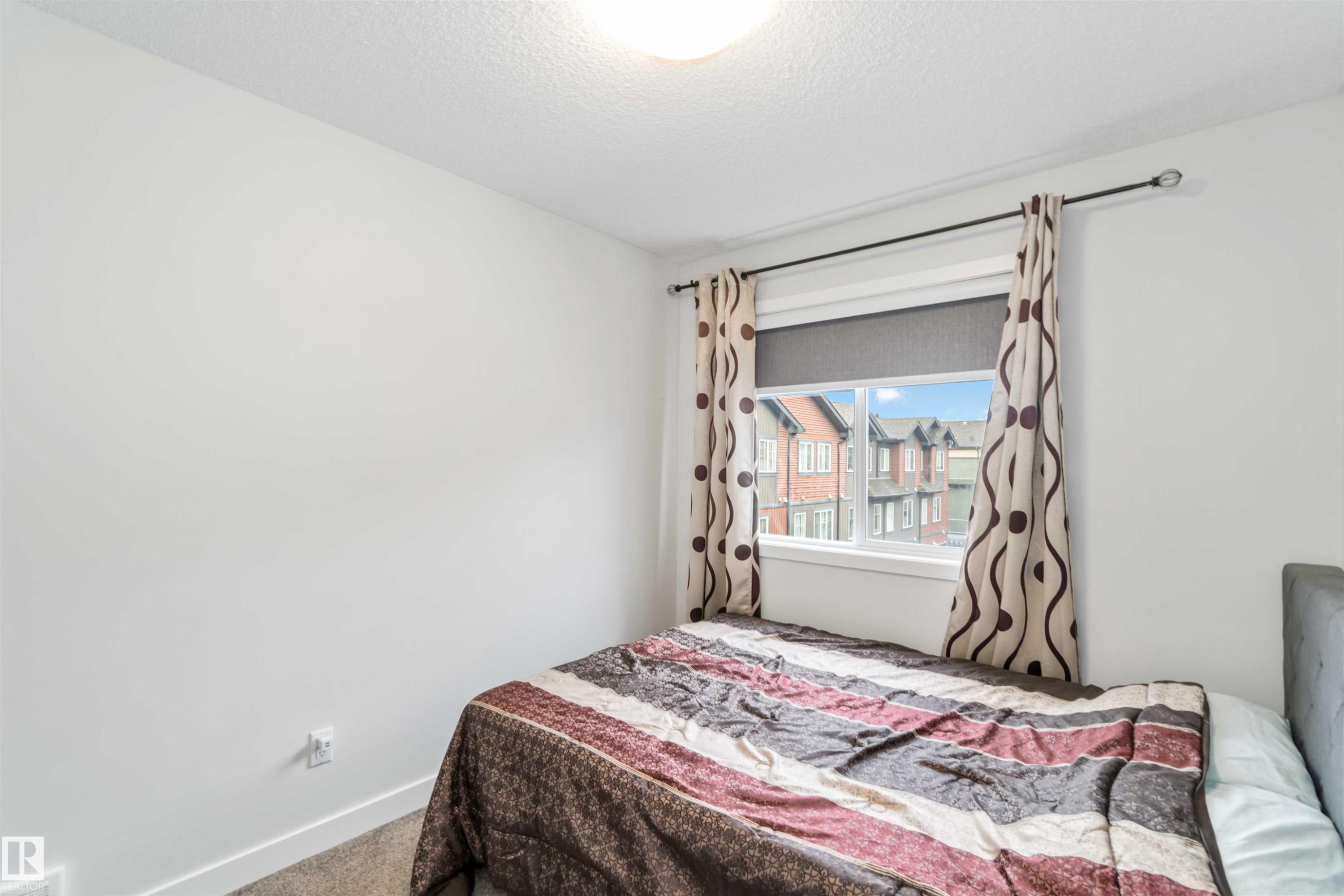 3 3305 Orchards Link Sw, Edmonton, AB - Indoor Photo Showing Bedroom