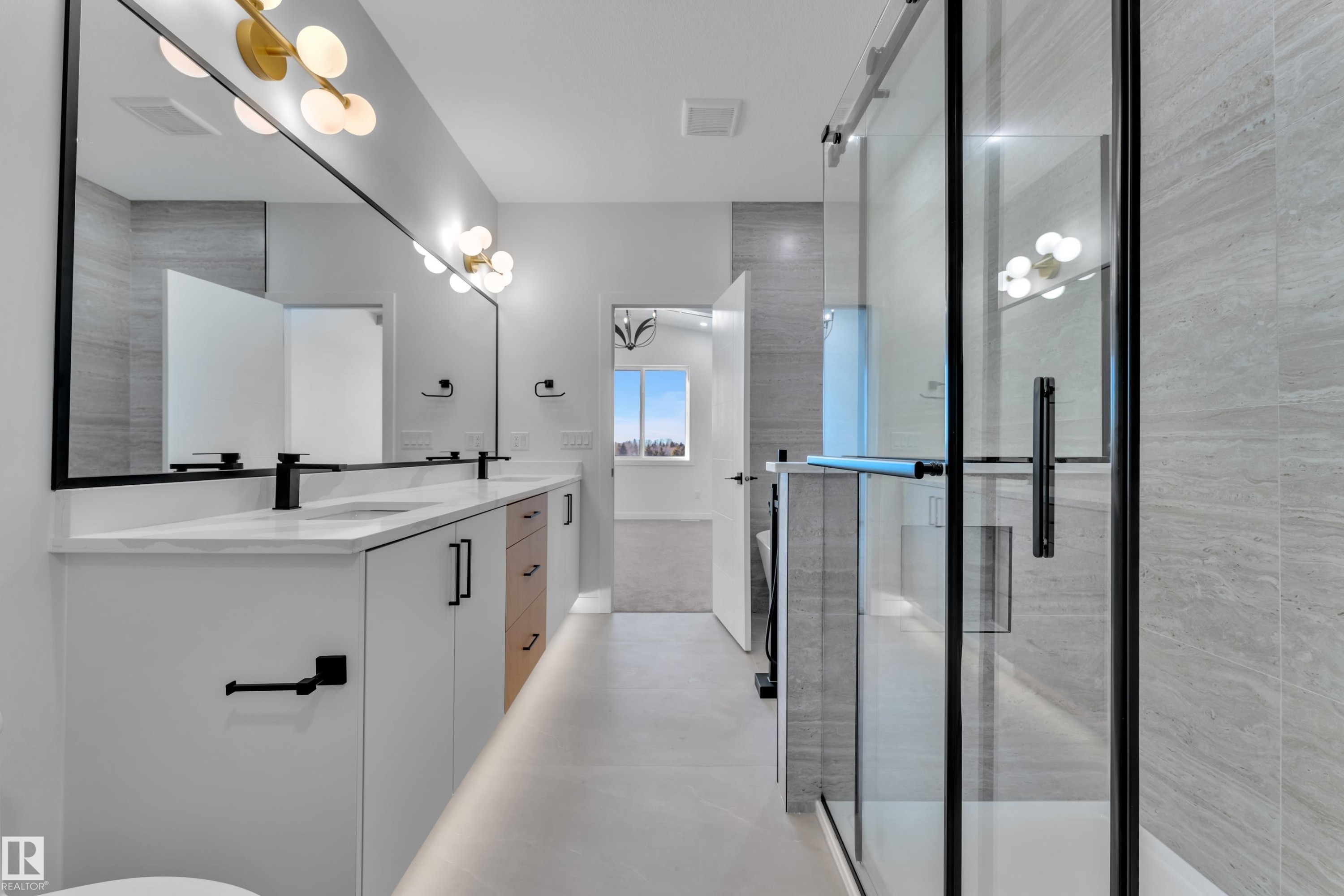 Full bath with double vanity, a shower stall, and light tile patterned floors - 38 Grayson Green, Stony Plain, AB - Indoor Photo Showing Bathroom