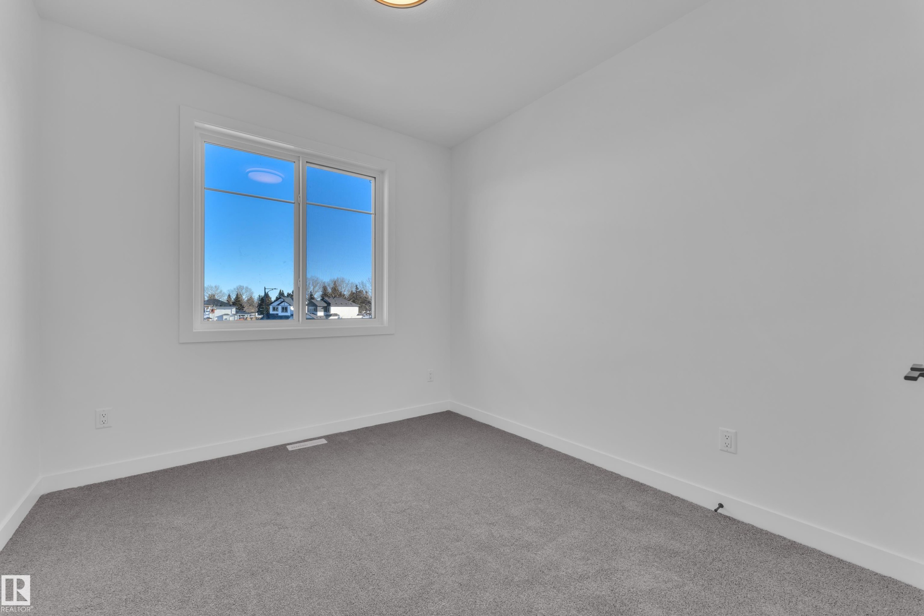 Unfurnished room with baseboards and carpet - 38 Grayson Green, Stony Plain, AB - Indoor Photo Showing Other Room