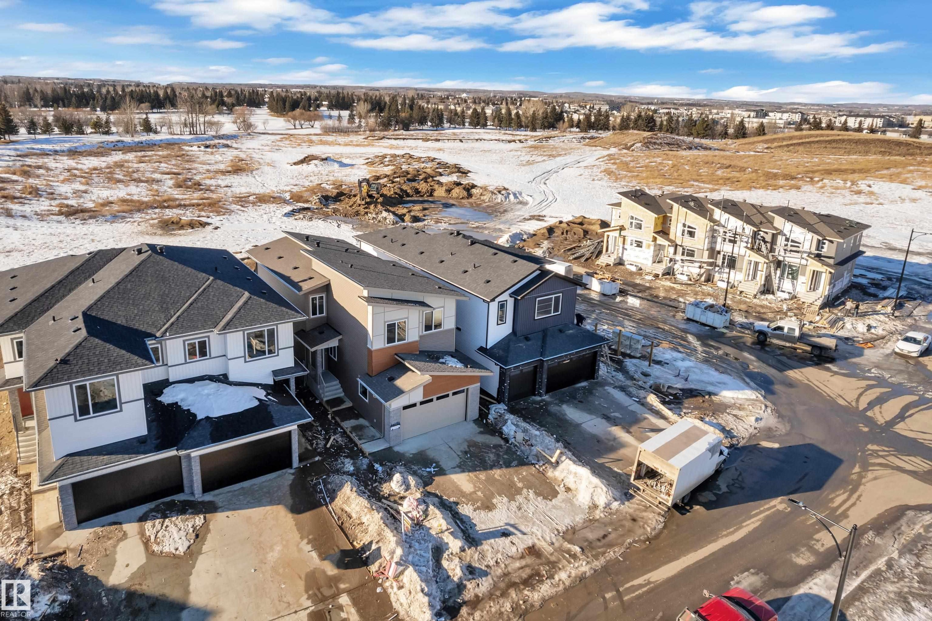 Snowy aerial view with a residential view - 38 Grayson Green, Stony Plain, AB - Outdoor With View