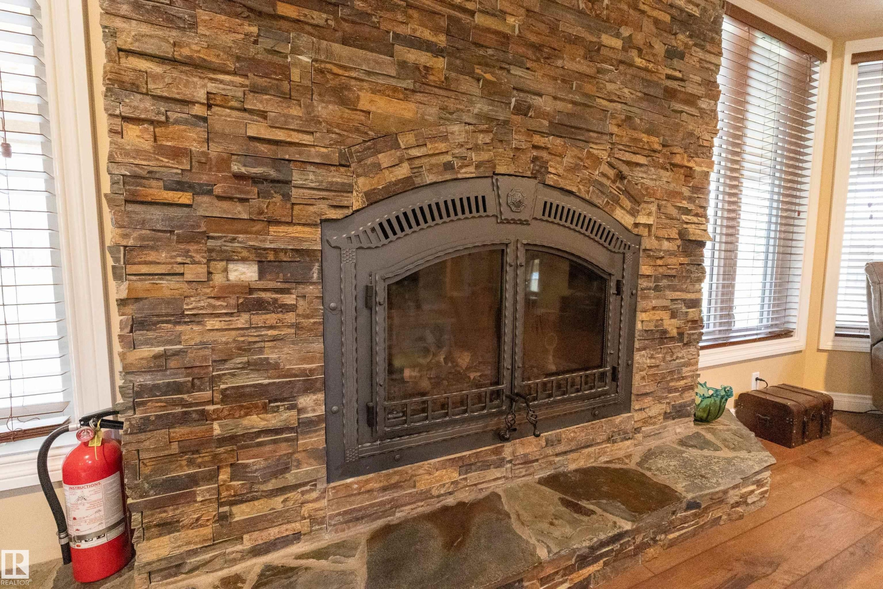 #14 52001 Rge Road 275, Rural Parkland County, AB - Indoor Photo Showing Living Room With Fireplace