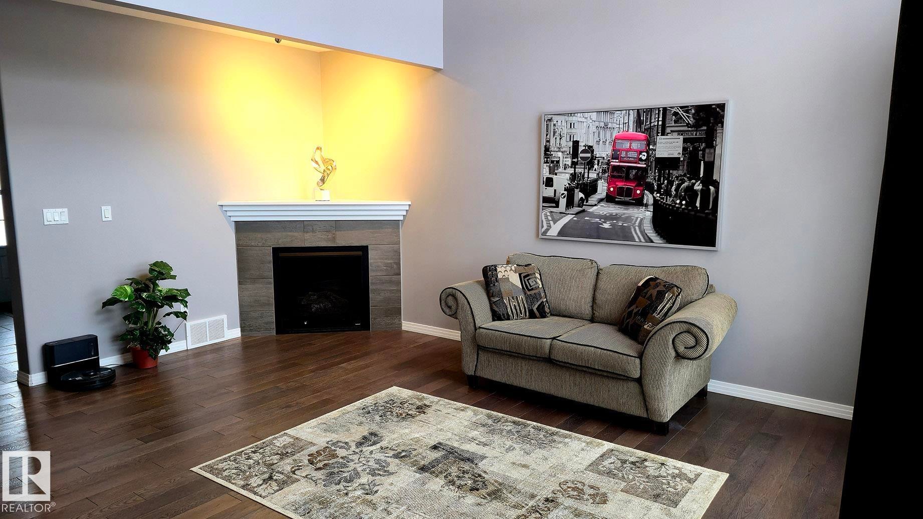 1325 Adamson Drive, Edmonton, AB - Indoor Photo Showing Living Room With Fireplace