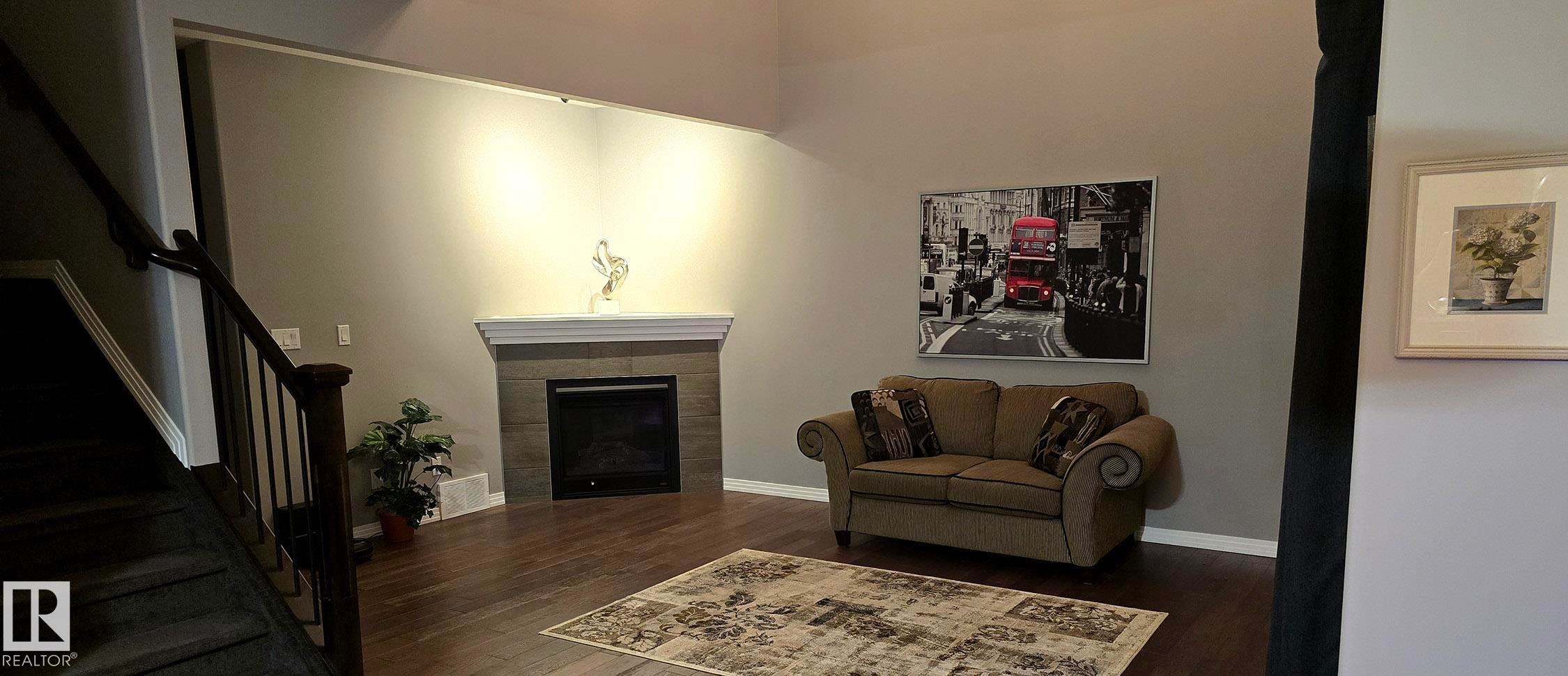 1325 Adamson Drive, Edmonton, AB - Indoor Photo Showing Living Room With Fireplace