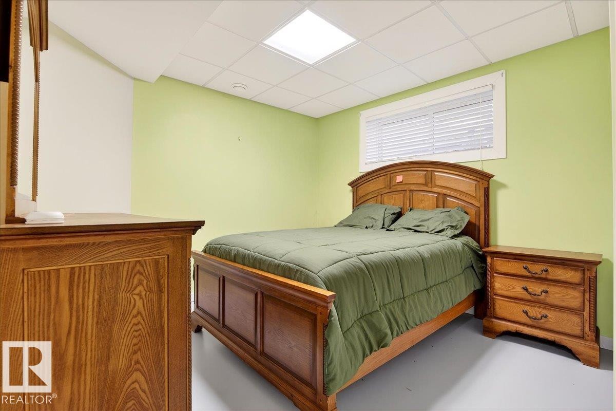 Bedroom with a paneled ceiling - 5019 48 Avenue, Chipman, AB - Indoor Photo Showing Bedroom