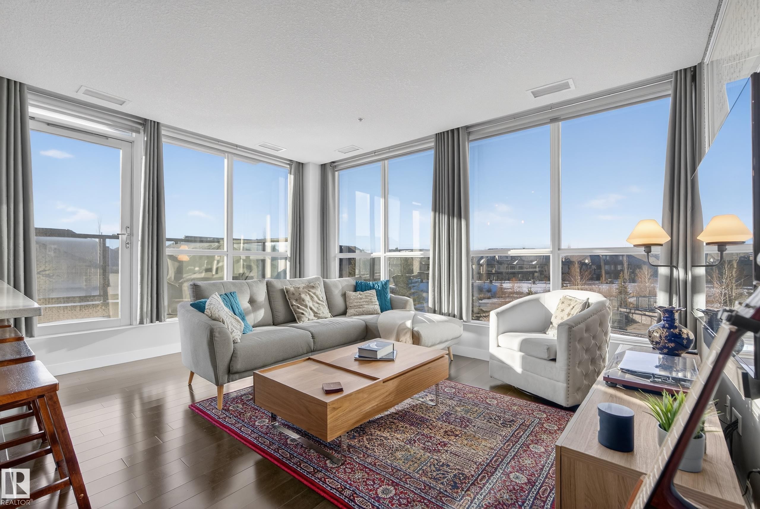 201 5151 Windermere Boulevard, Edmonton, AB - Indoor Photo Showing Living Room