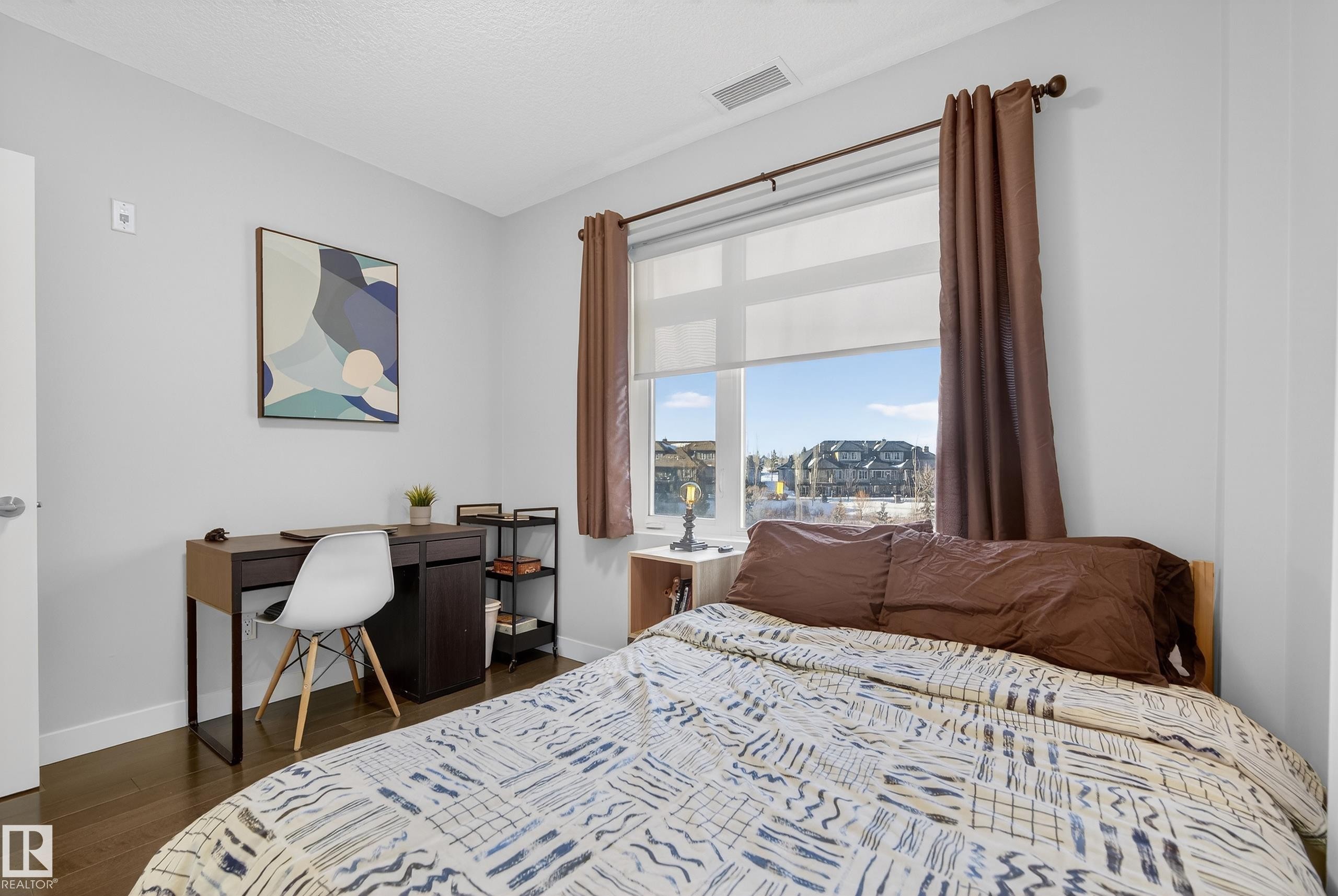 201 5151 Windermere Boulevard, Edmonton, AB - Indoor Photo Showing Bedroom