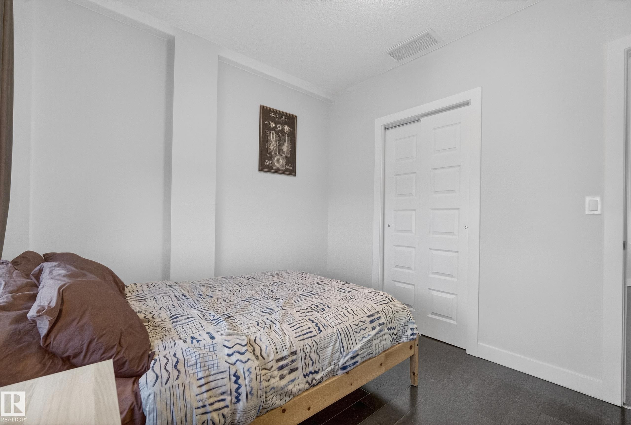 201 5151 Windermere Boulevard, Edmonton, AB - Indoor Photo Showing Bedroom