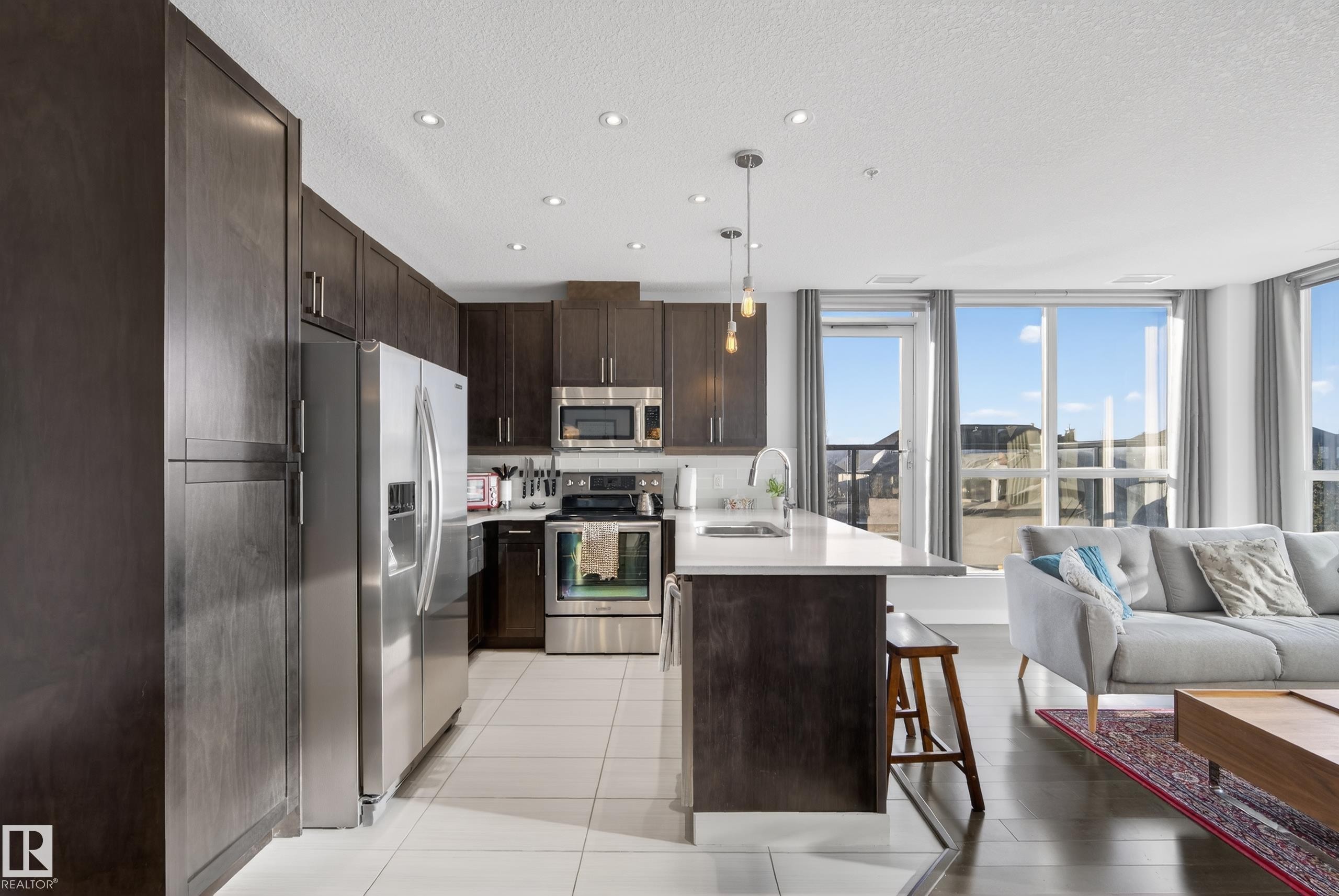 201 5151 Windermere Boulevard, Edmonton, AB - Indoor Photo Showing Kitchen With Upgraded Kitchen