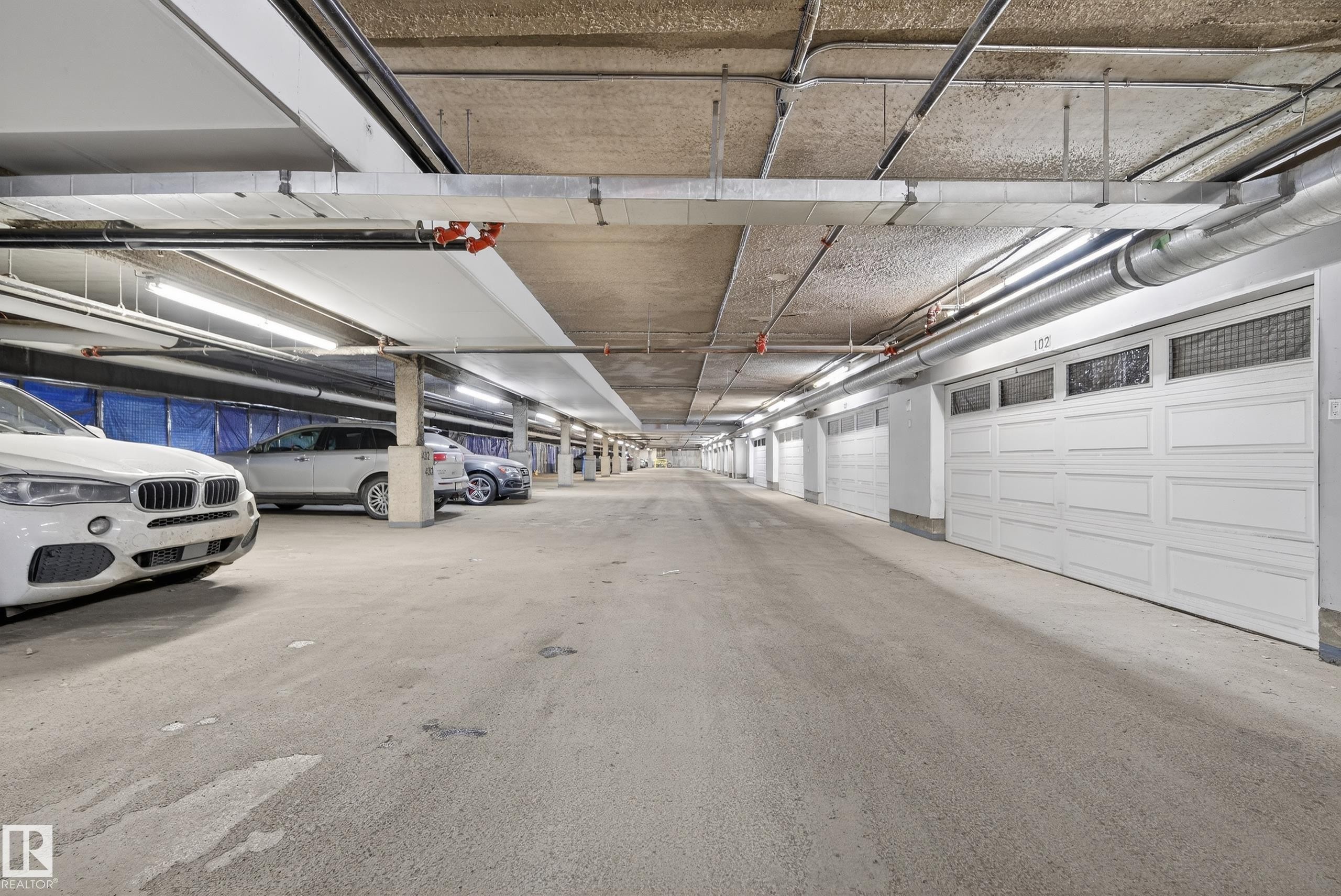 201 5151 Windermere Boulevard, Edmonton, AB - Indoor Photo Showing Garage