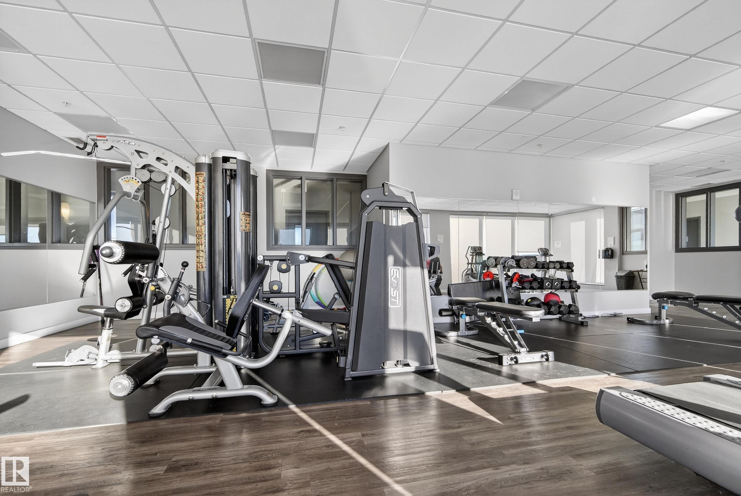 201 5151 Windermere Boulevard, Edmonton, AB - Indoor Photo Showing Gym Room