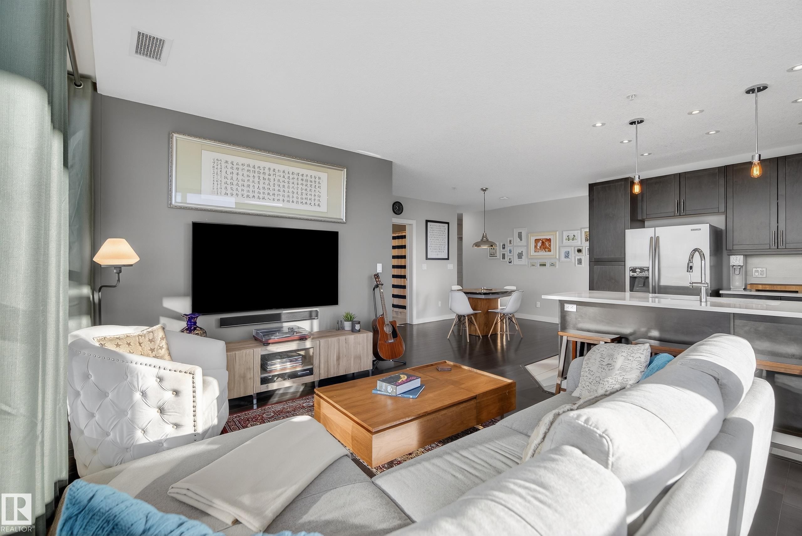201 5151 Windermere Boulevard, Edmonton, AB - Indoor Photo Showing Living Room