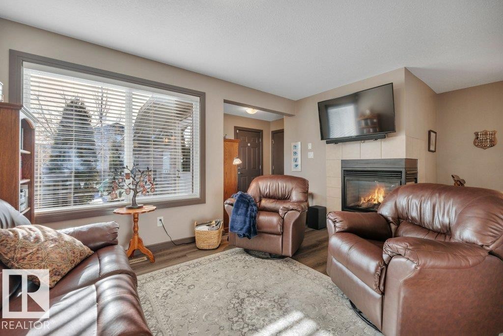 497 Chappelle Drive, Edmonton, AB - Indoor Photo Showing Living Room With Fireplace
