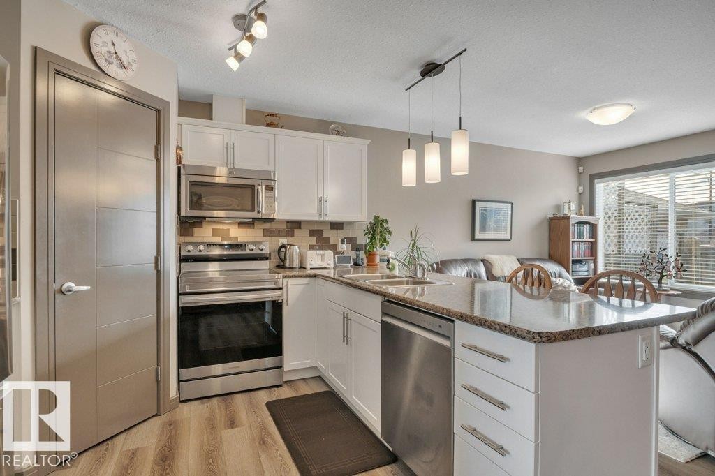 497 Chappelle Drive, Edmonton, AB - Indoor Photo Showing Kitchen With Stainless Steel Kitchen With Double Sink