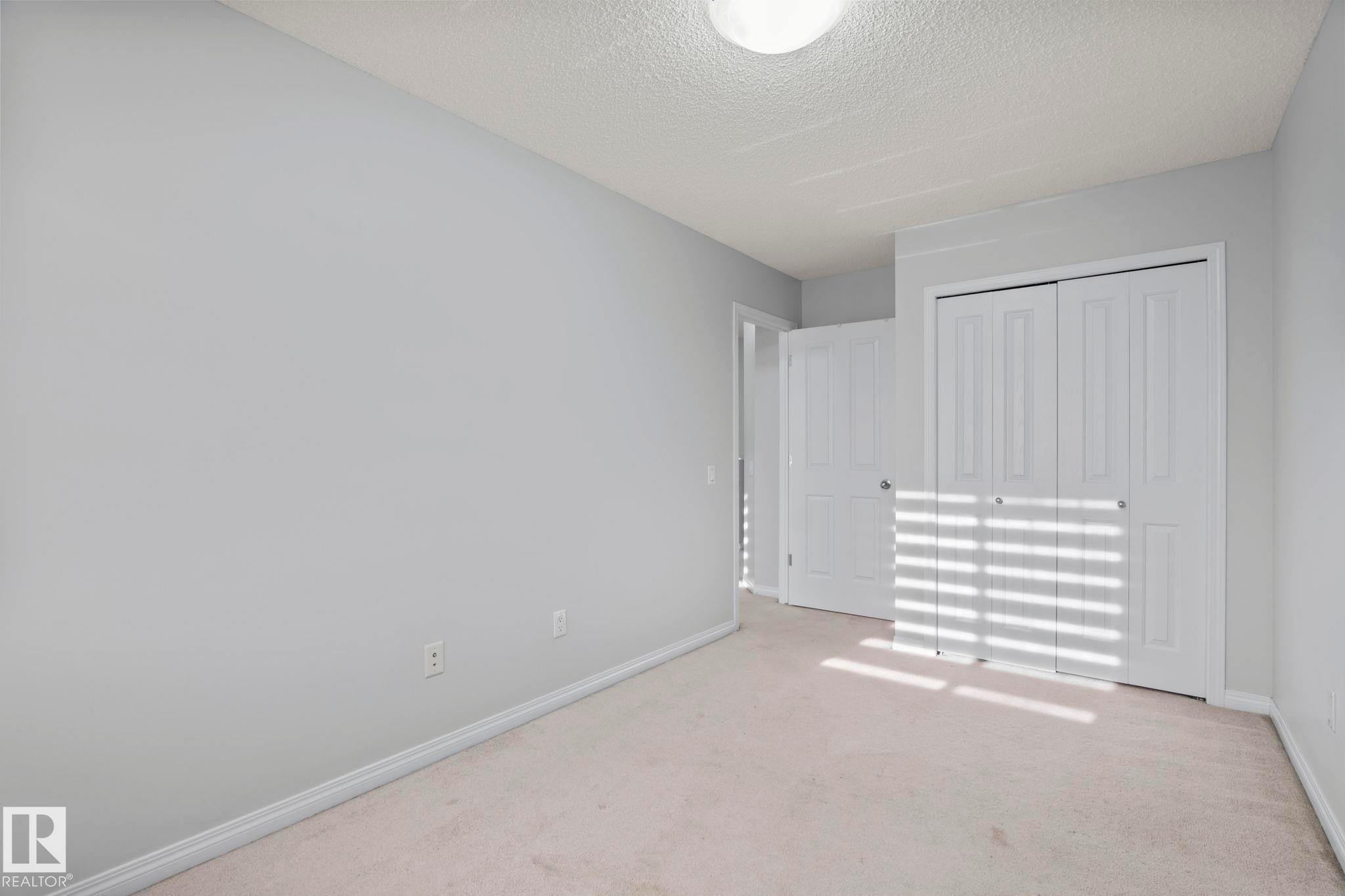 #62 4050 Savaryn Drive Sw, Edmonton, AB - Indoor Photo Showing Other Room