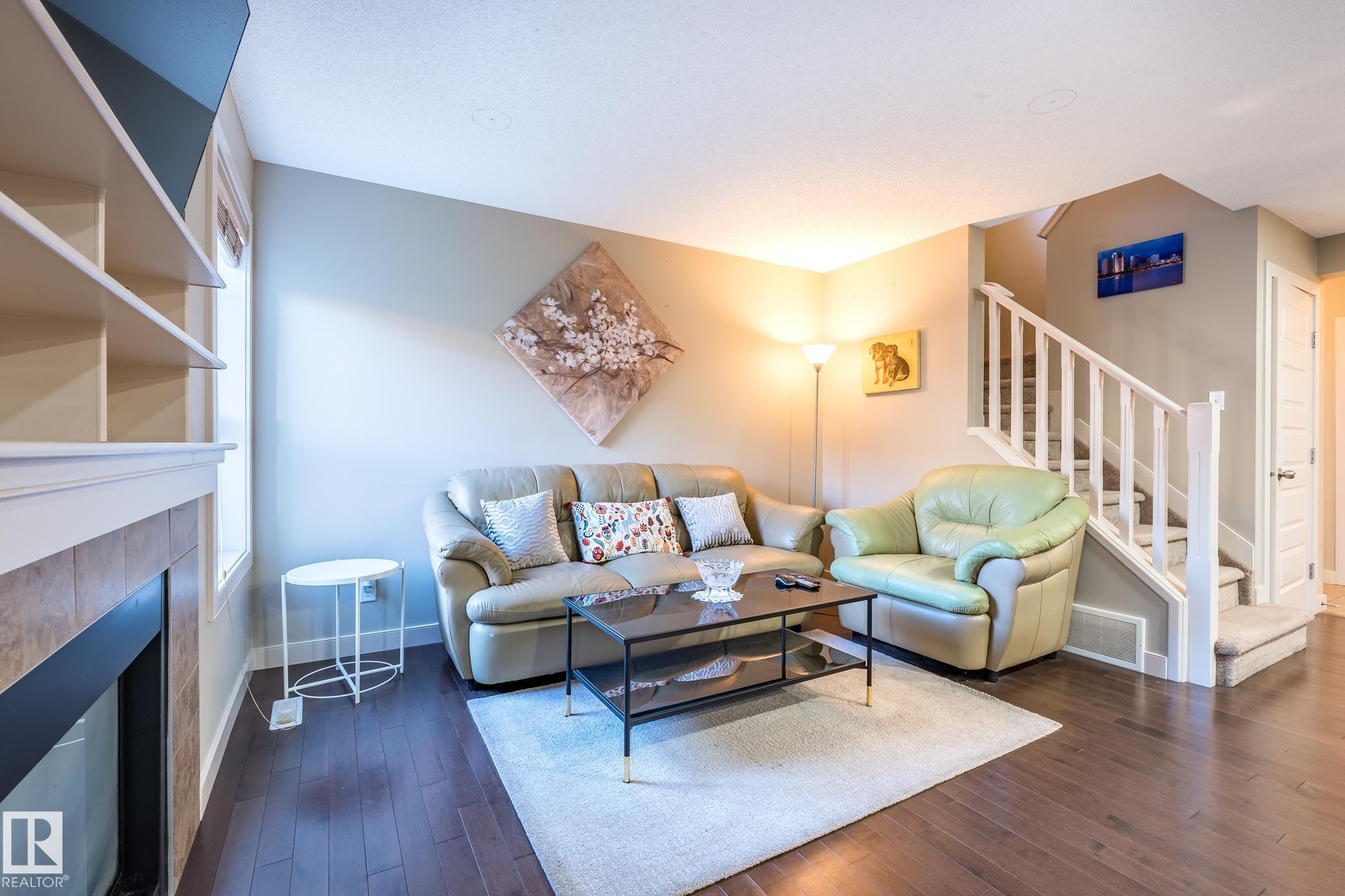 1692 Cunningham Way, Edmonton, AB - Indoor Photo Showing Living Room With Fireplace