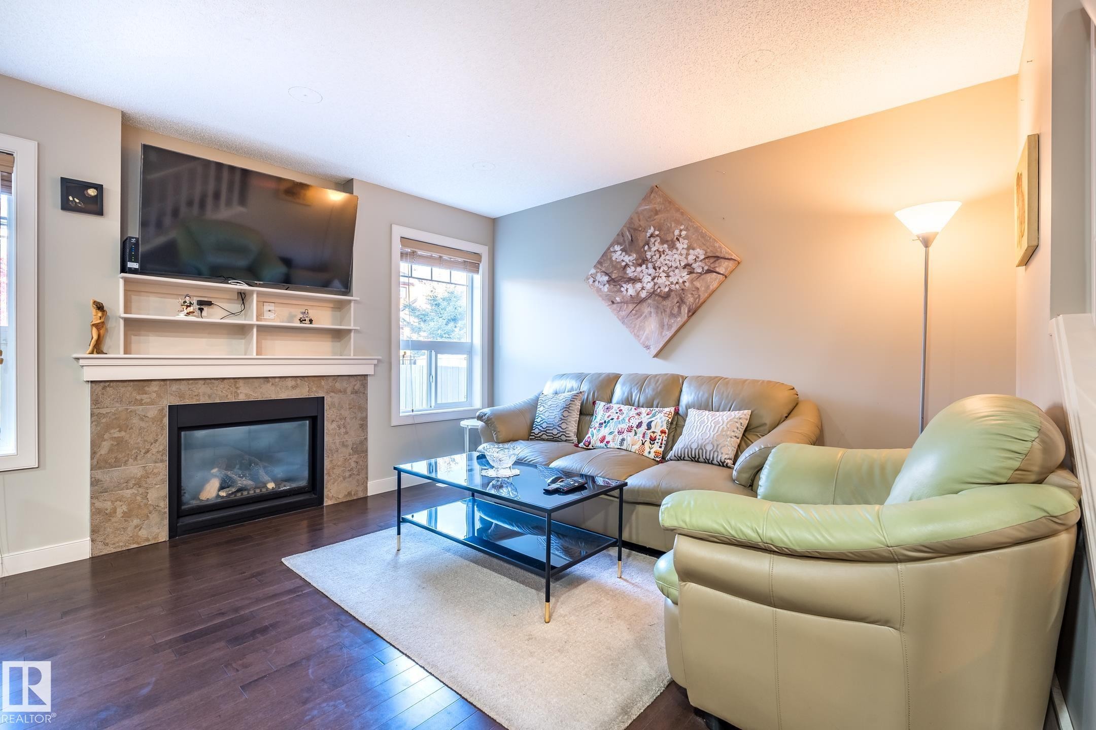 1692 Cunningham Way, Edmonton, AB - Indoor Photo Showing Living Room With Fireplace