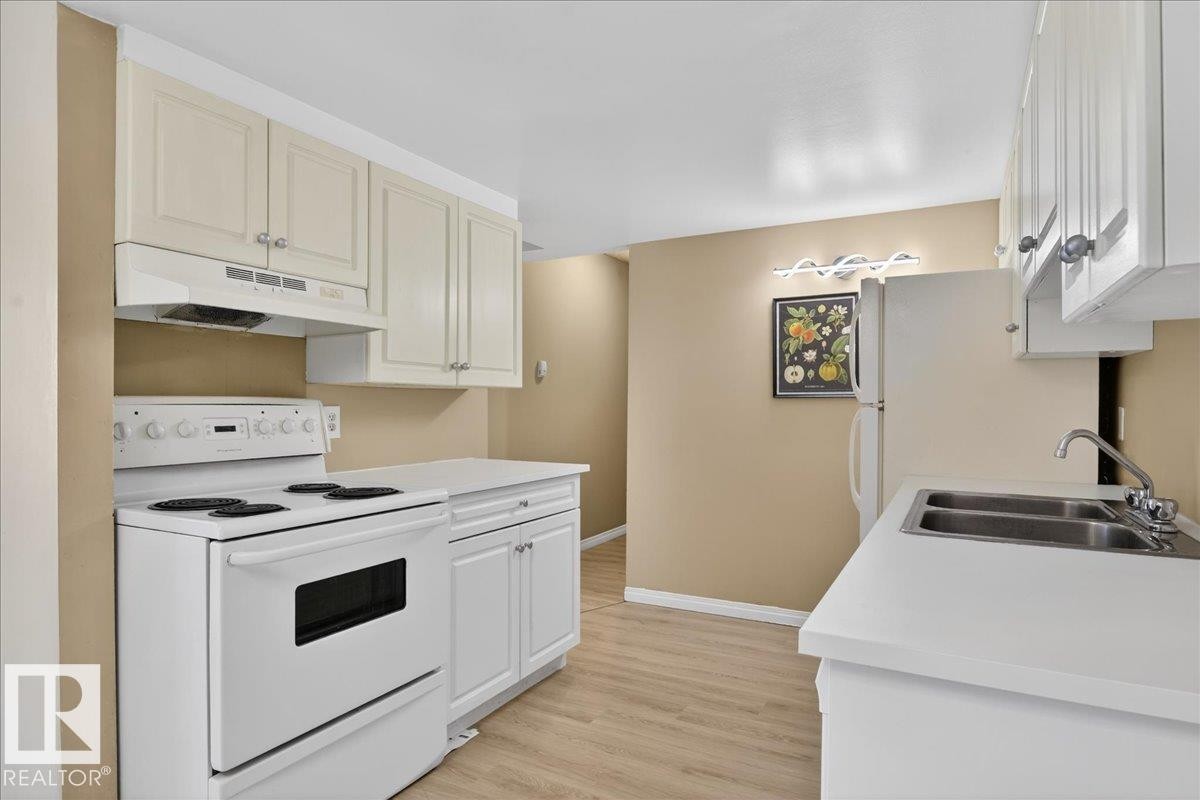 309 2908 116A Avenue, Edmonton, AB - Indoor Photo Showing Kitchen With Double Sink