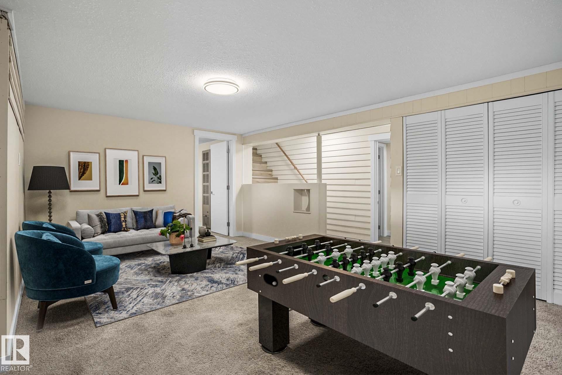 Recreation room with carpet and a textured ceiling - 11222 71 Avenue, Edmonton, AB - Indoor Photo Showing Other Room