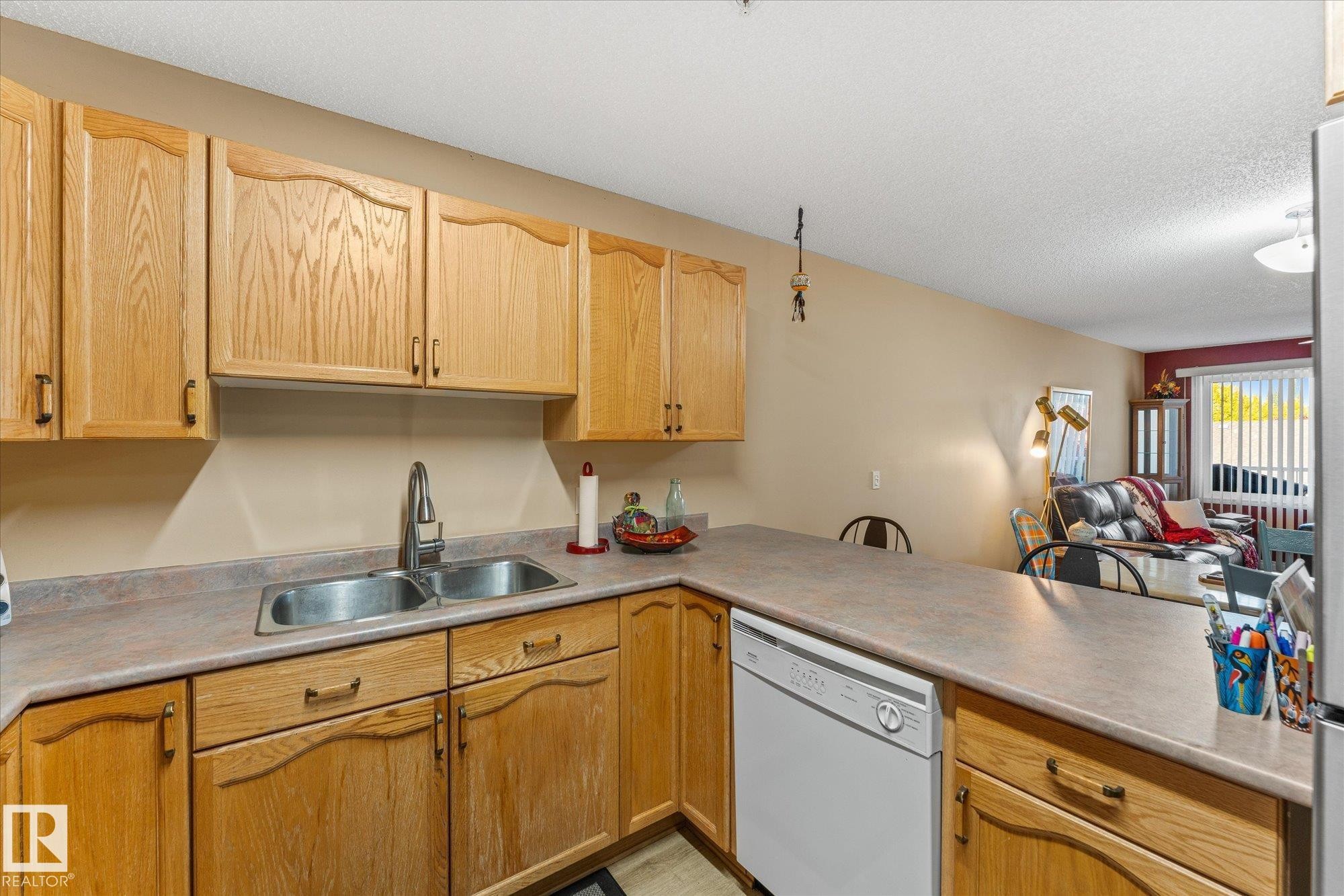 203 160 Kingswood Boulevard, St. Albert, AB - Indoor Photo Showing Kitchen With Double Sink
