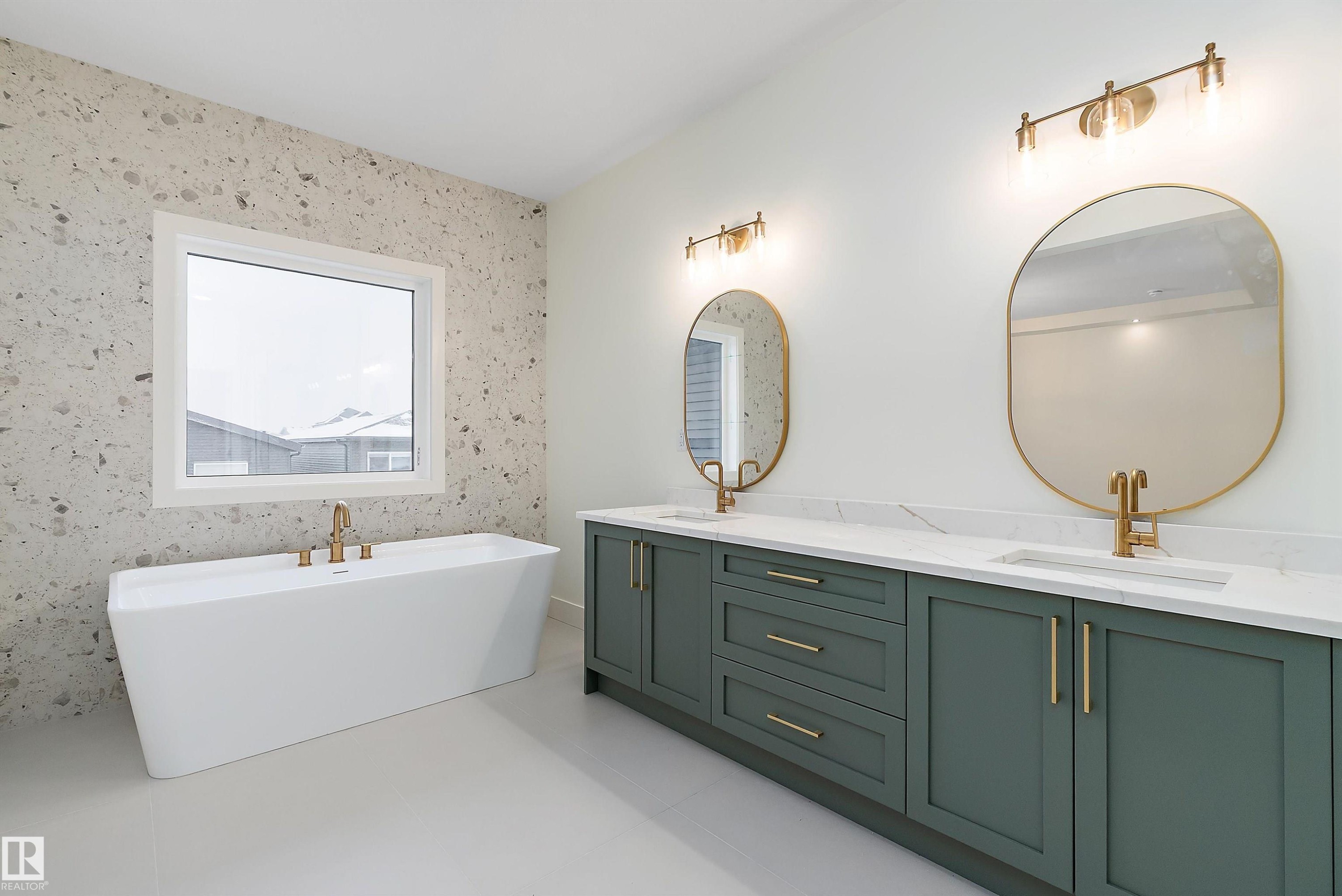 Bathroom featuring a soaking tub and double vanity - Edmonton, AB - Indoor Photo Showing Bathroom
