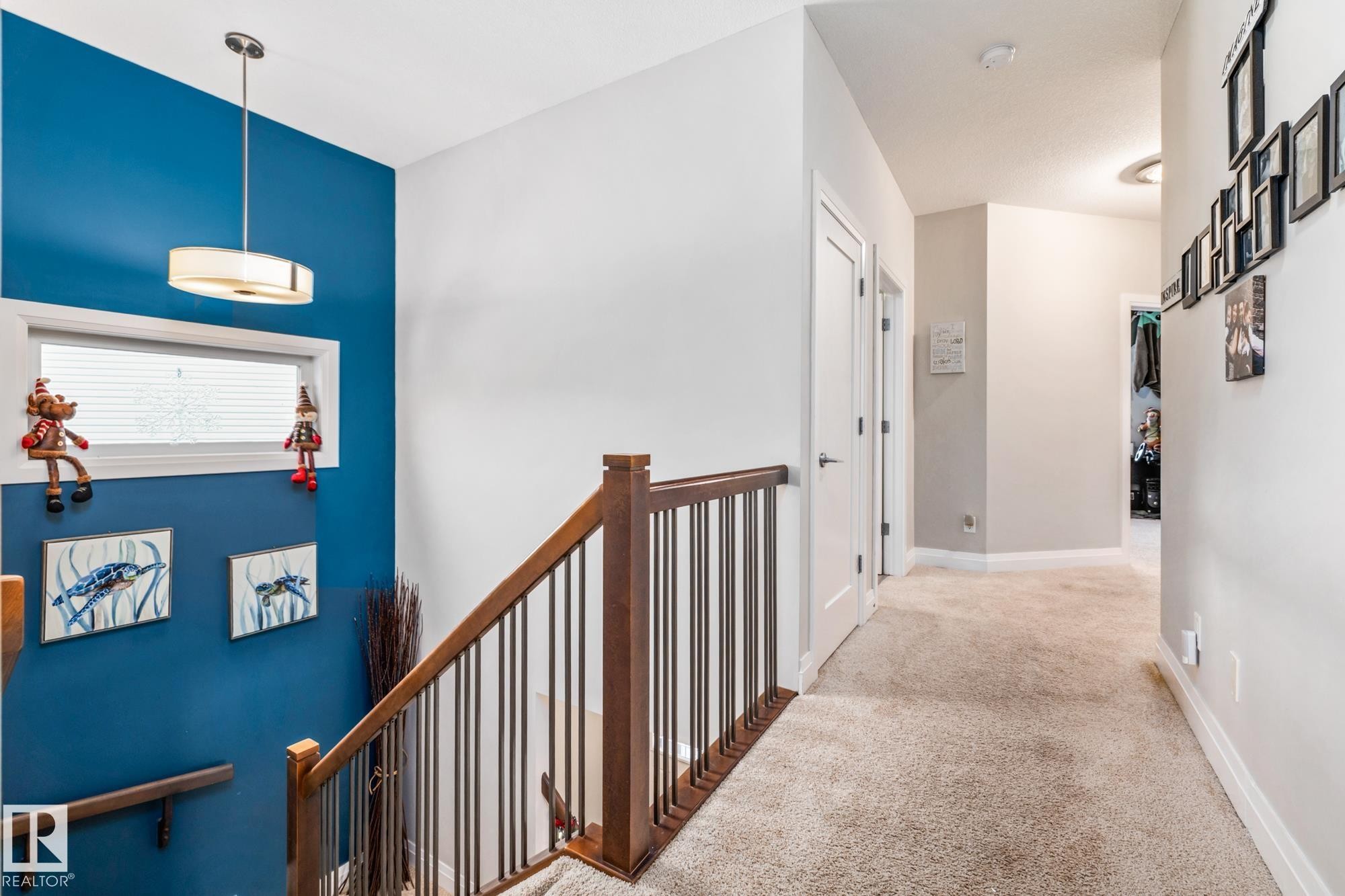 Hallway featuring carpet flooring and an upstairs landing - 14 Spring Bay, Spruce Grove, AB - Indoor Photo Showing Other Room